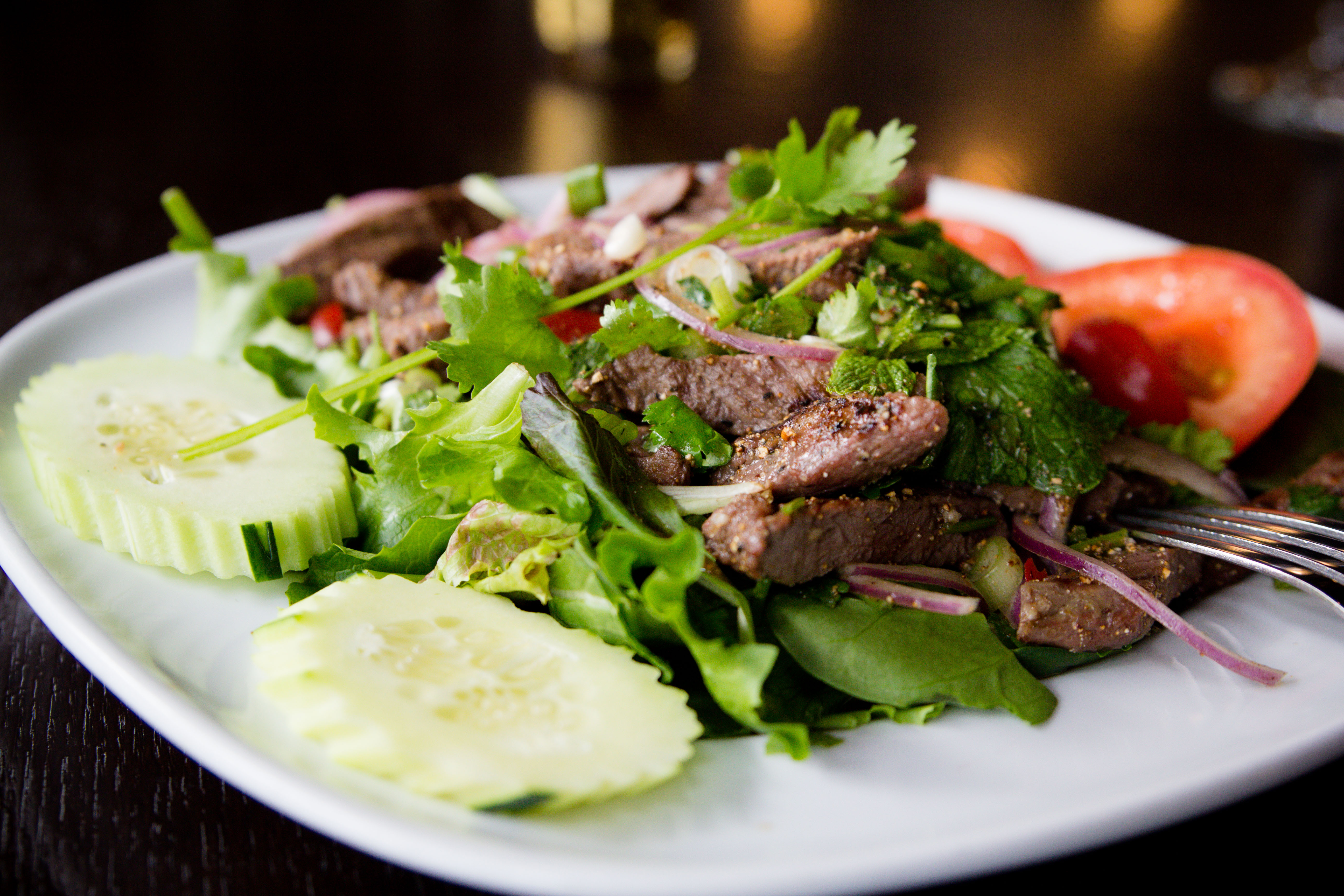 Order Bangkok Beef Salad food online from Lotus Thai store, San Diego on bringmethat.com