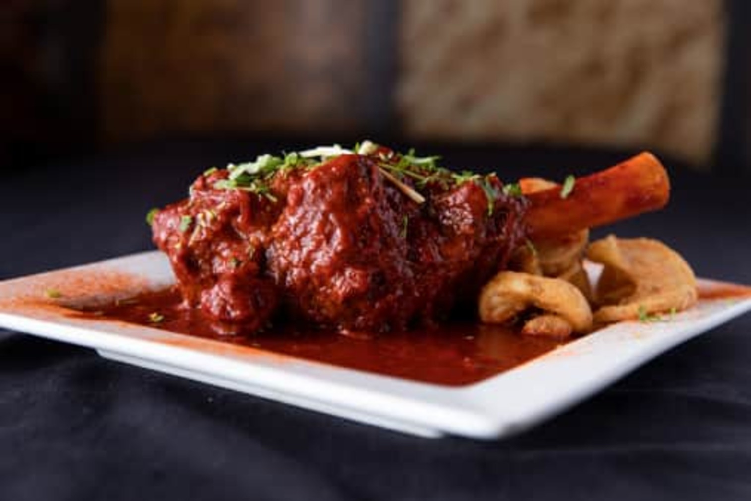 Order Lal Mass Lamb Shank food online from Holi Indian Grill store, Panama City on bringmethat.com