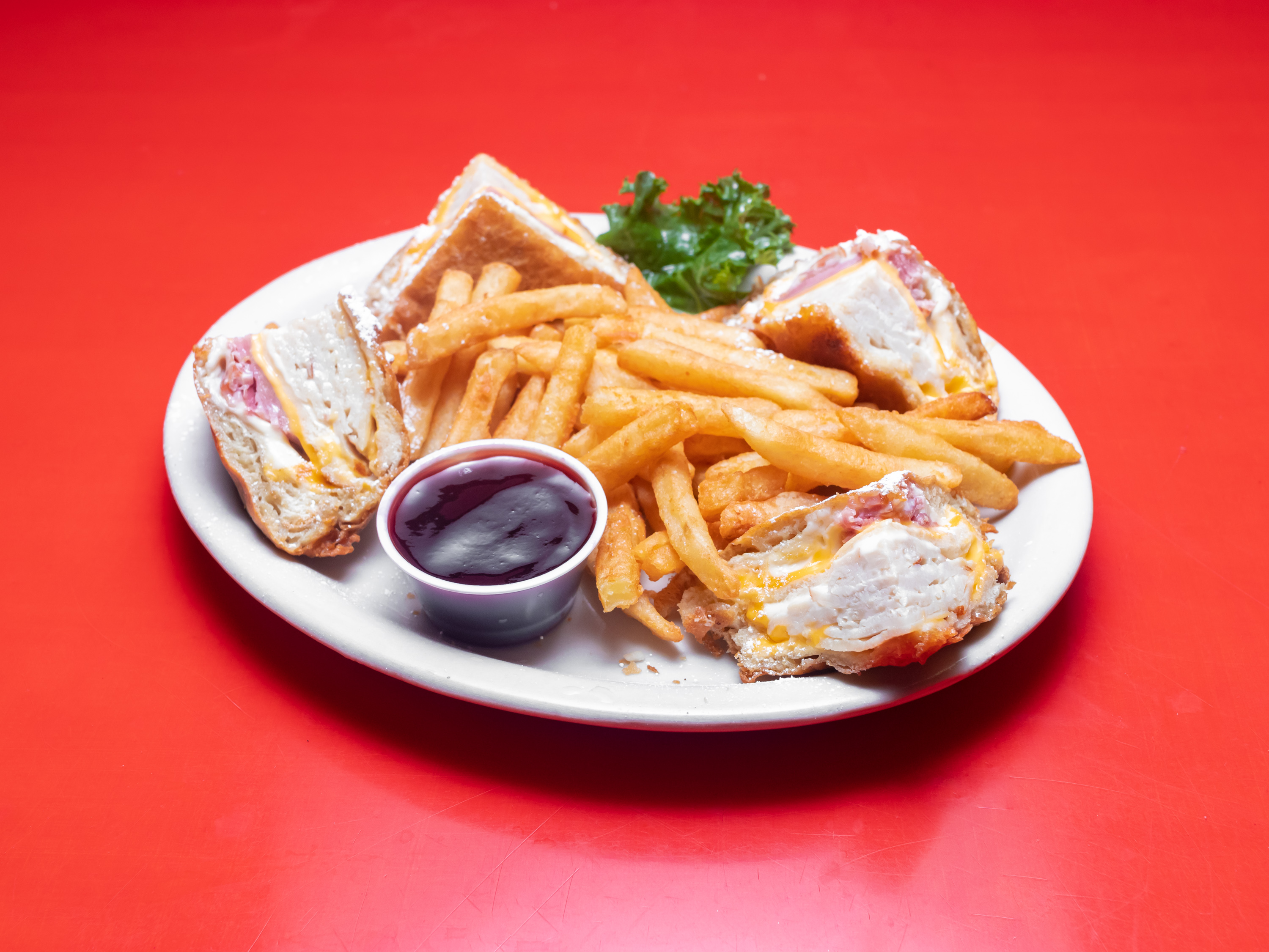 Order Monte Cristo Sandwich food online from Wolfies Restaurants & Sports Bars store, Sugar Land on bringmethat.com