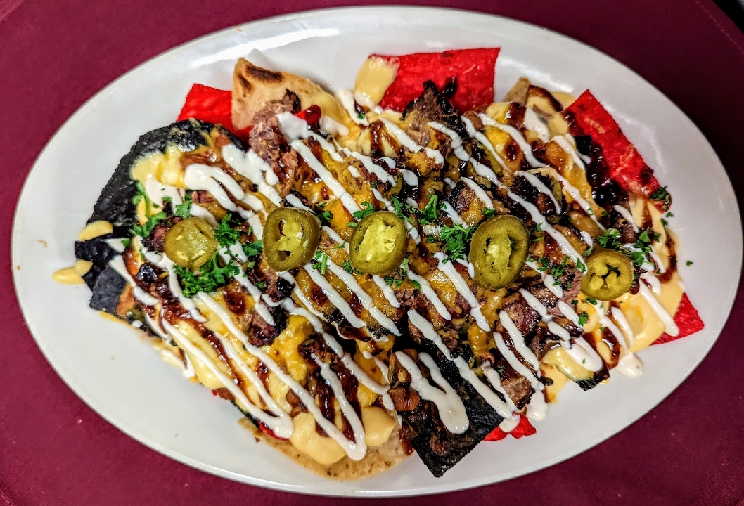 Order BBQ Nachos food online from C.A.Y.A. Smoke House Grill store, Walled Lake on bringmethat.com