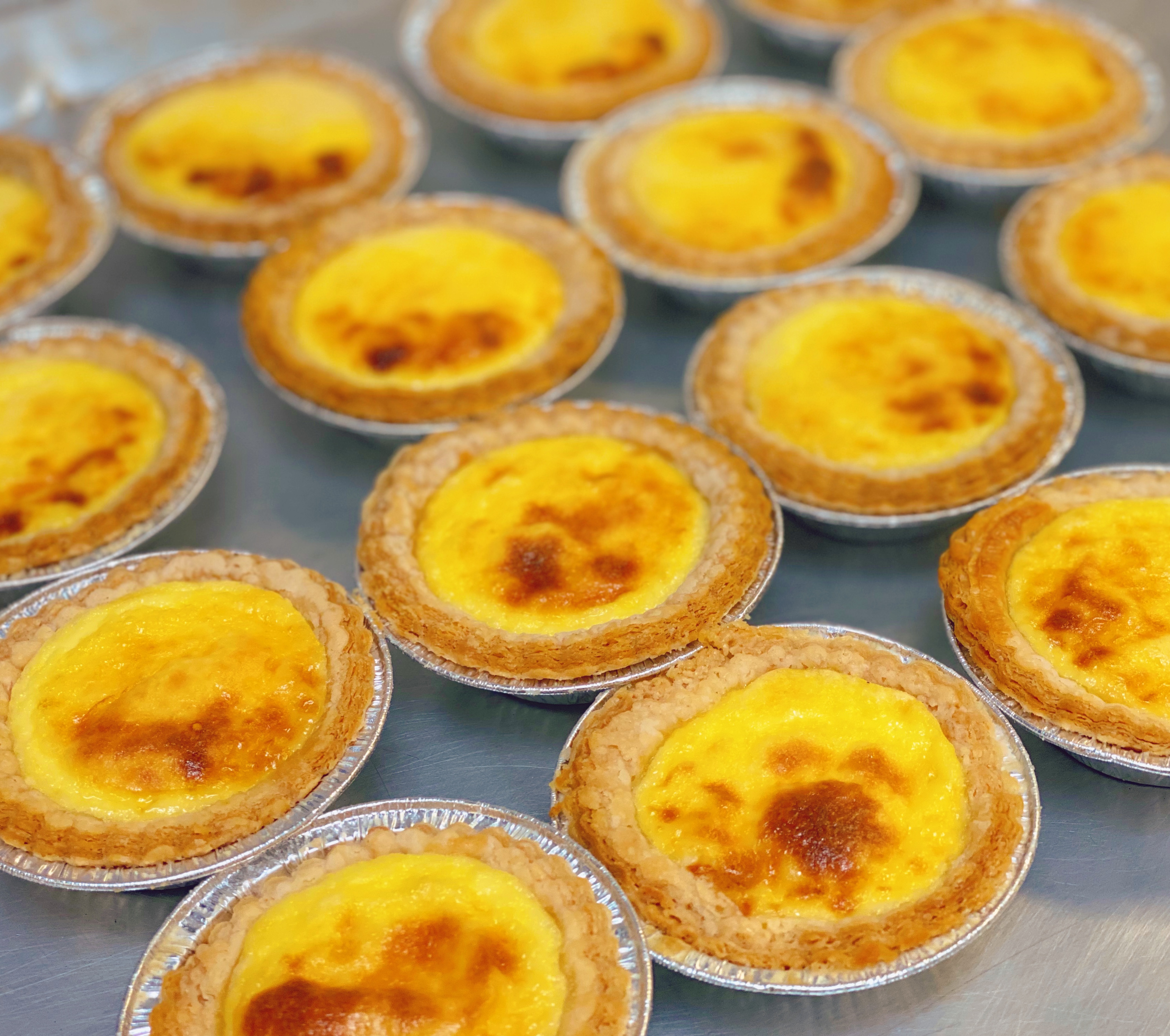 Order Egg Tart x2 葡式蛋挞 2个 food online from 1ny Bakery & Cafe store, West Lafayette on bringmethat.com