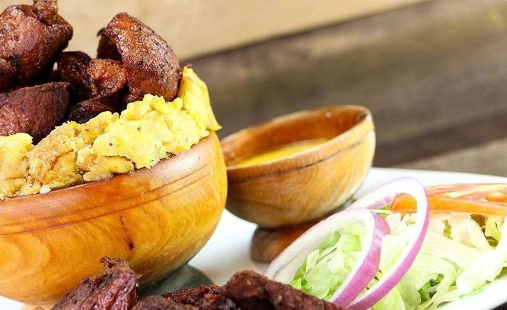 Order Mofongo with Fried Pork Chunks ( Chicharron ) food online from Mofongos store, Wilmington on bringmethat.com
