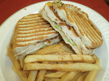 Order Chicken Breast Club Panini food online from Tharsy Grill store, Baltimore on bringmethat.com