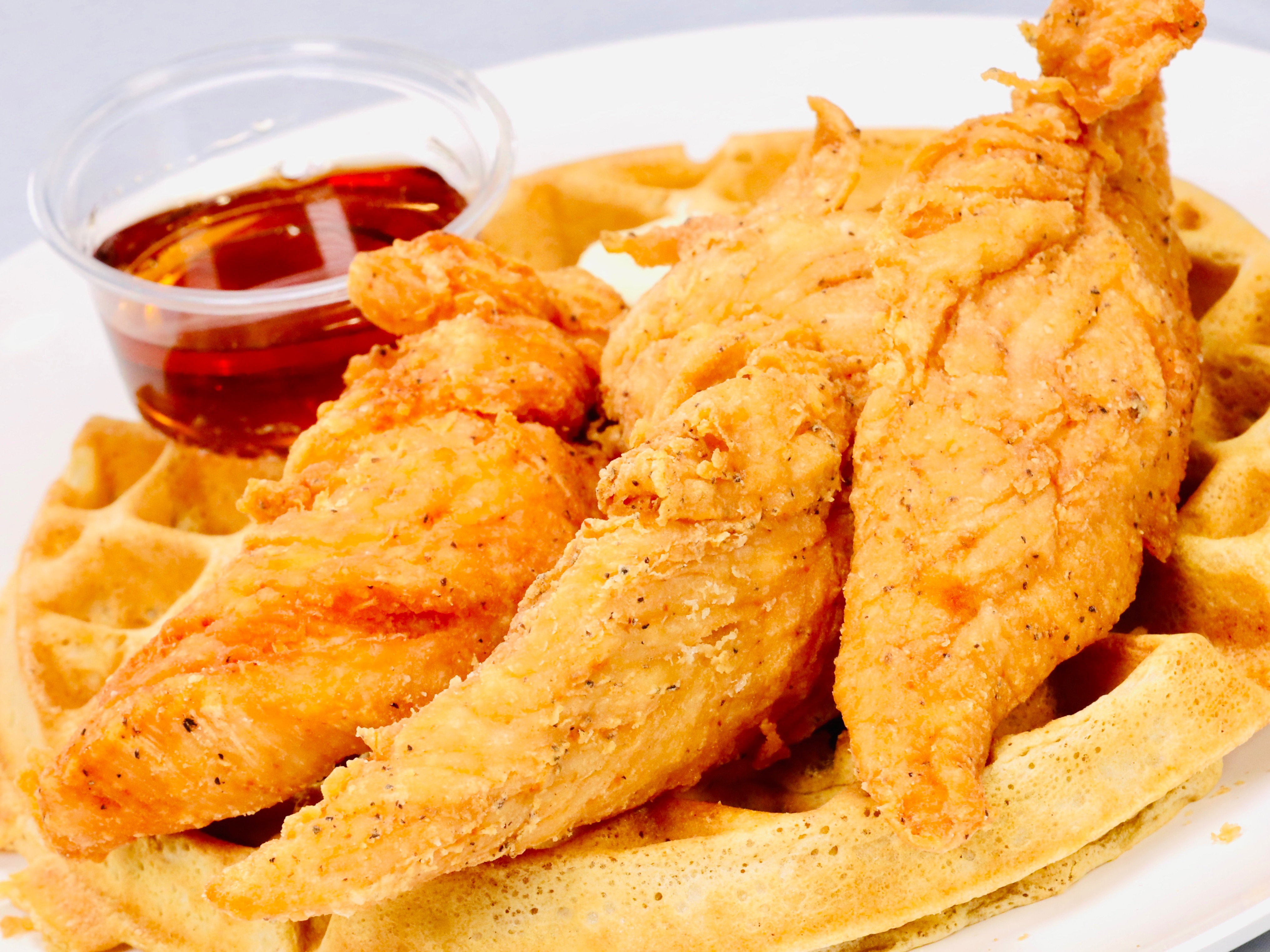 Order 3 Chicken Tenders & Waffle food online from Sam Sylk Chicken And Fish store, Euclid on bringmethat.com