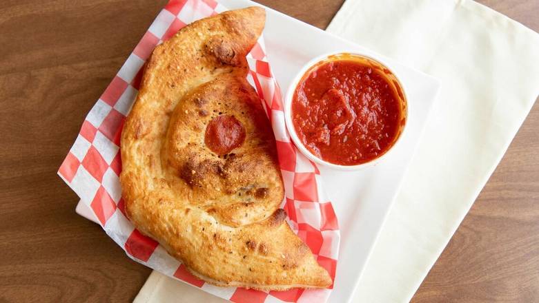 Order Cheese Calzone food online from Gino's Pizza store, Albuquerque on bringmethat.com