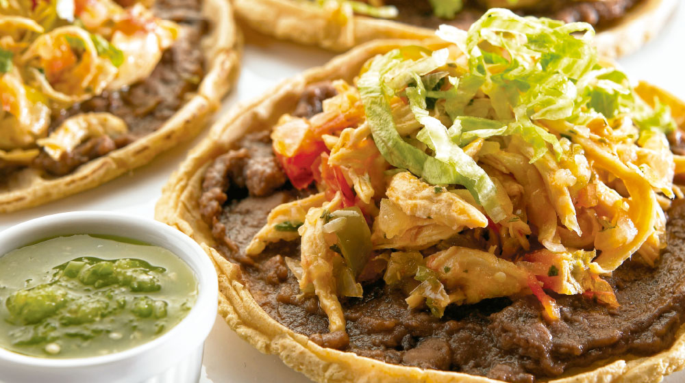 Order Pollo Sopes food online from Tortas El Chavo store, Irving on bringmethat.com