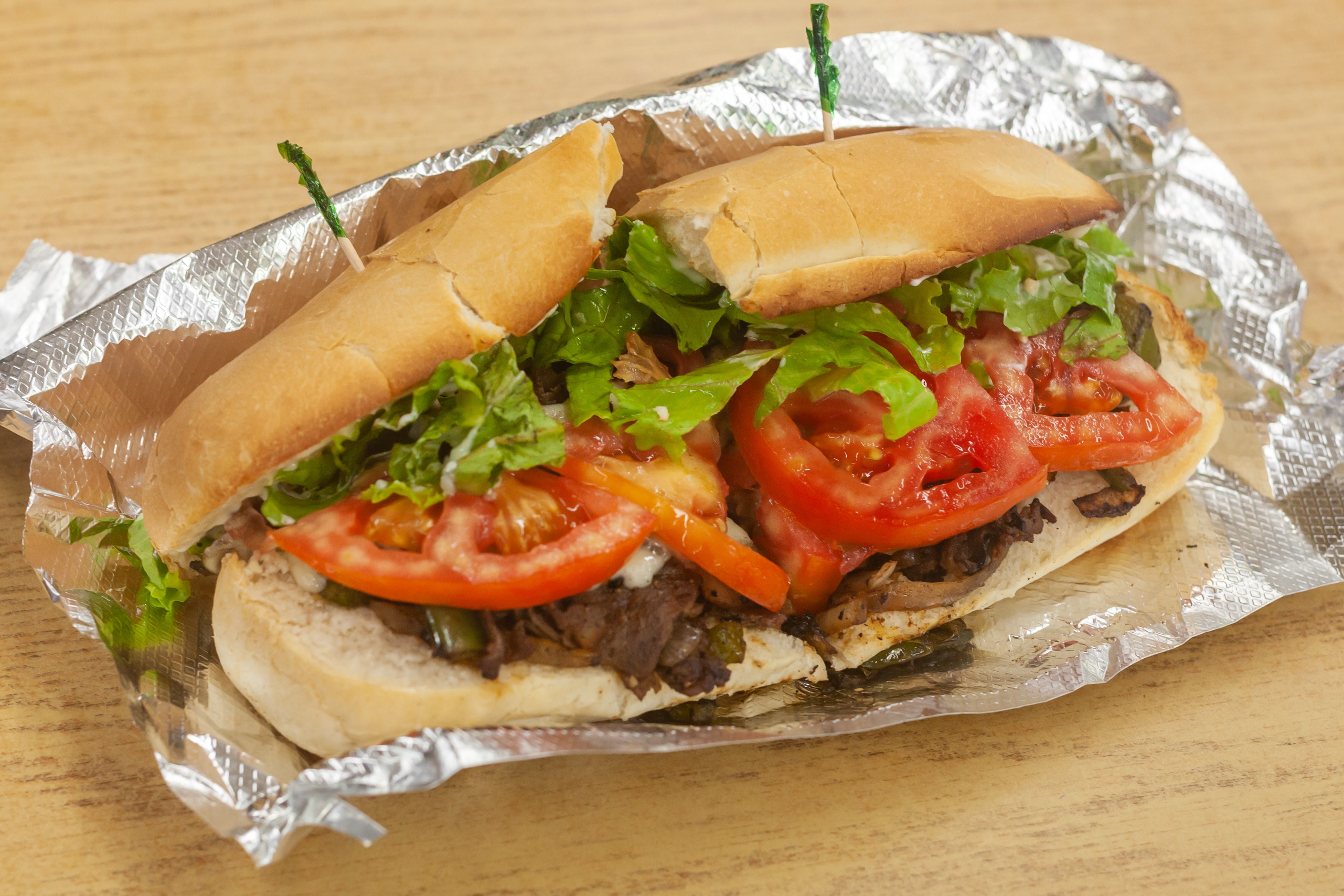 Order Rib Eye Philly Steak & Cheese Sub - 8" food online from M & M Pizza store, Manquin on bringmethat.com