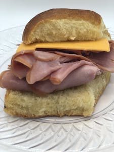 Order Ham & Cheddar Sandwhich Only food online from Anitas Famous Rolls store, Kansas City on bringmethat.com