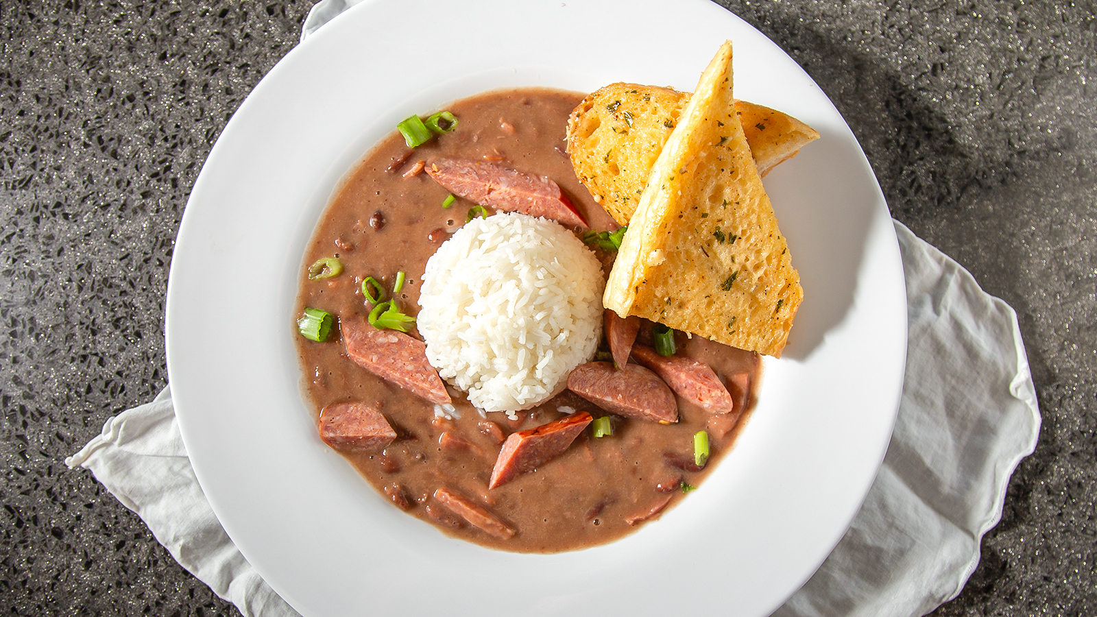 Order Red Beans ＆ Rice food online from Voodoo Daddy Steam Kitchen store, Tempe on bringmethat.com