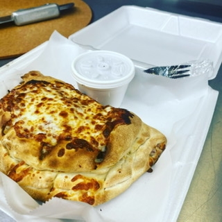 Order All Meat Calzone food online from Pizza Leon store, Austin on bringmethat.com