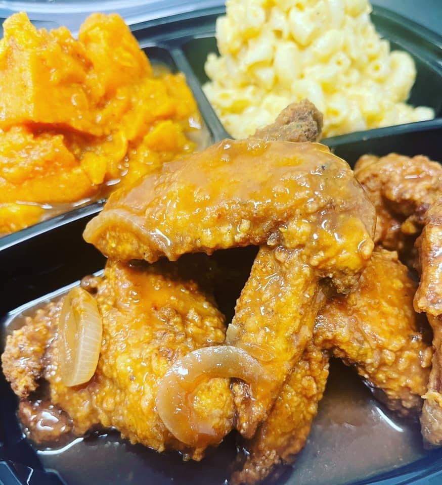 Order Smothered Wings with Rice food online from Kisha's Kitchen store, Chicago on bringmethat.com