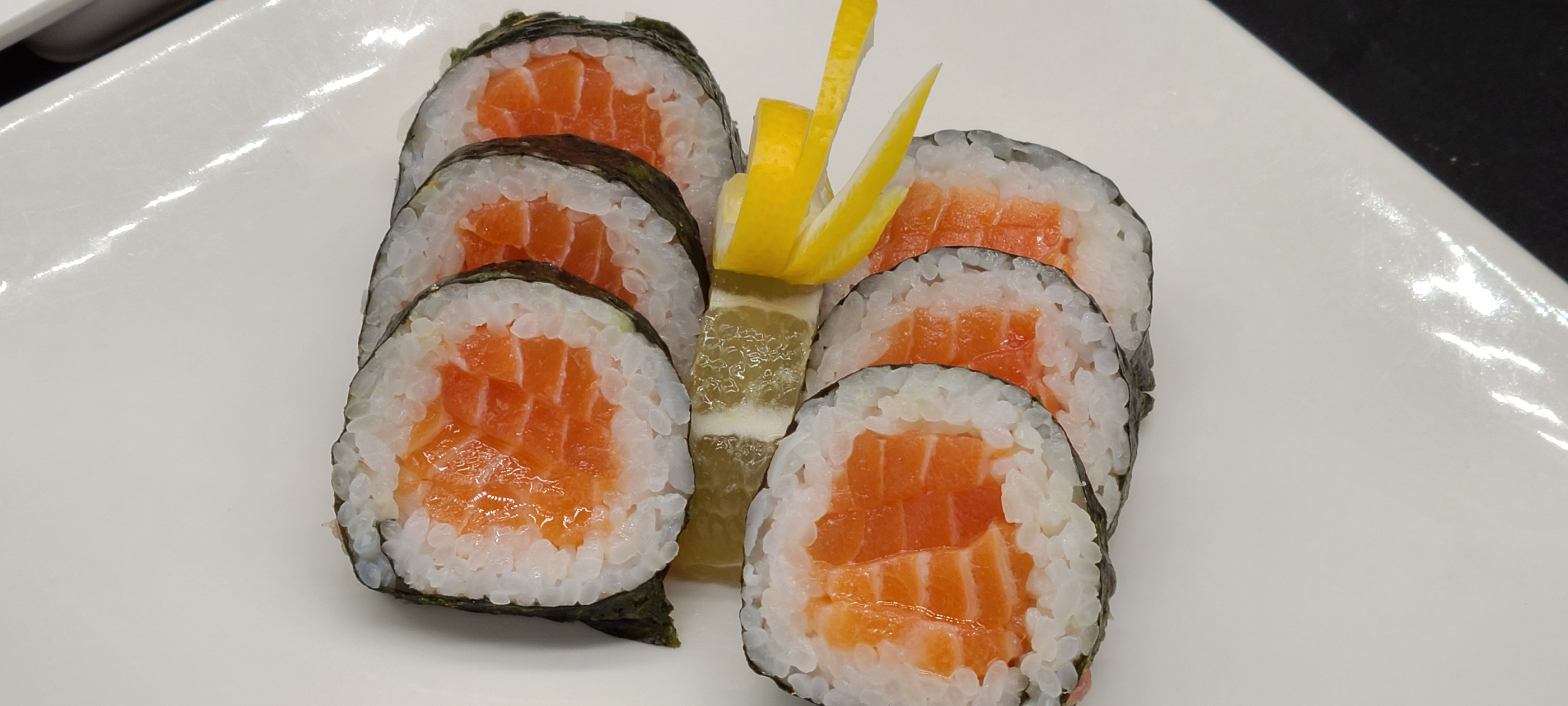 Order C4. Salmon Roll(5pcs) food online from Hello Sushi store, Fullerton on bringmethat.com