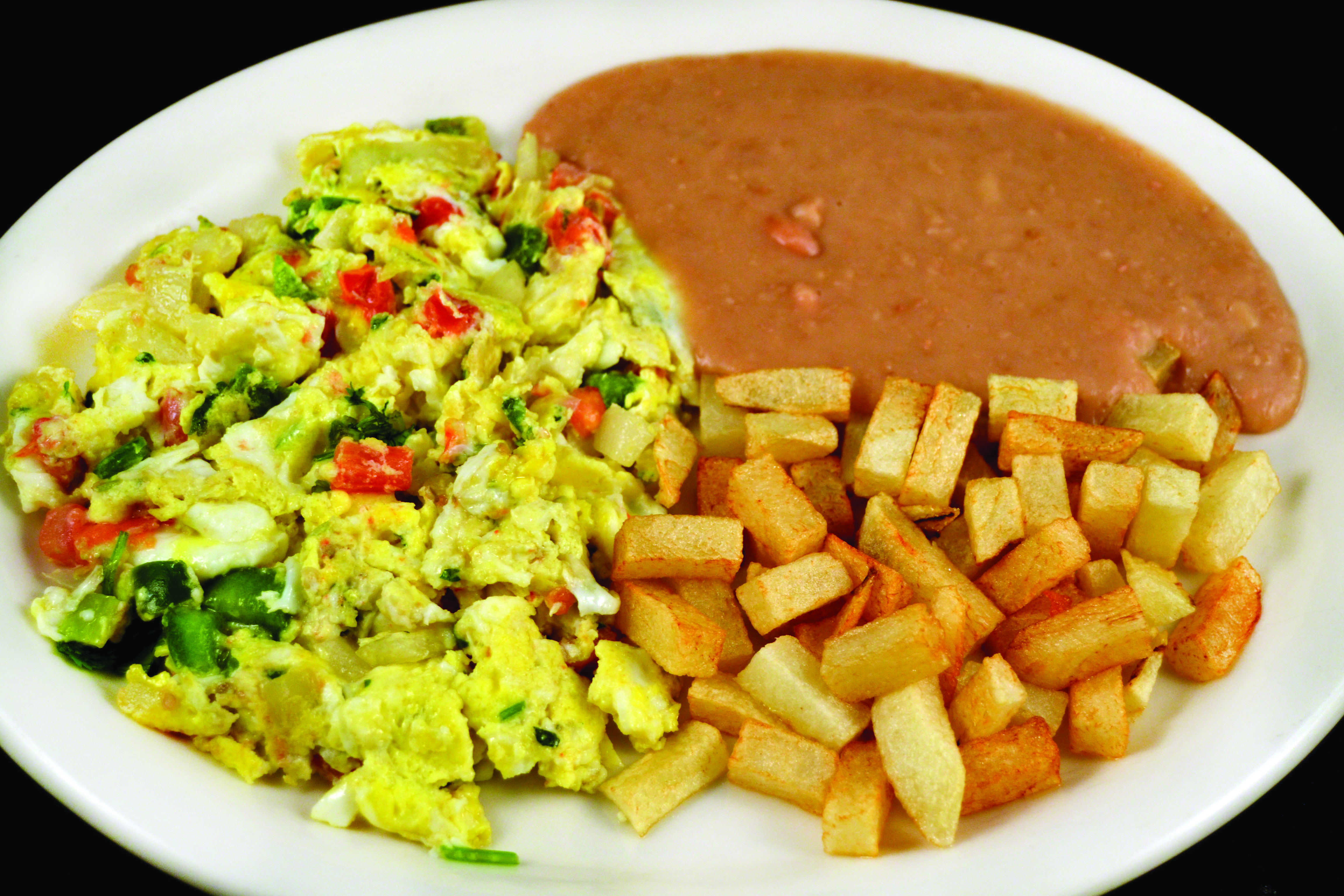 Order Huevos a la Mexicana food online from Mi Comal Mexican Restaurant store, Irving on bringmethat.com