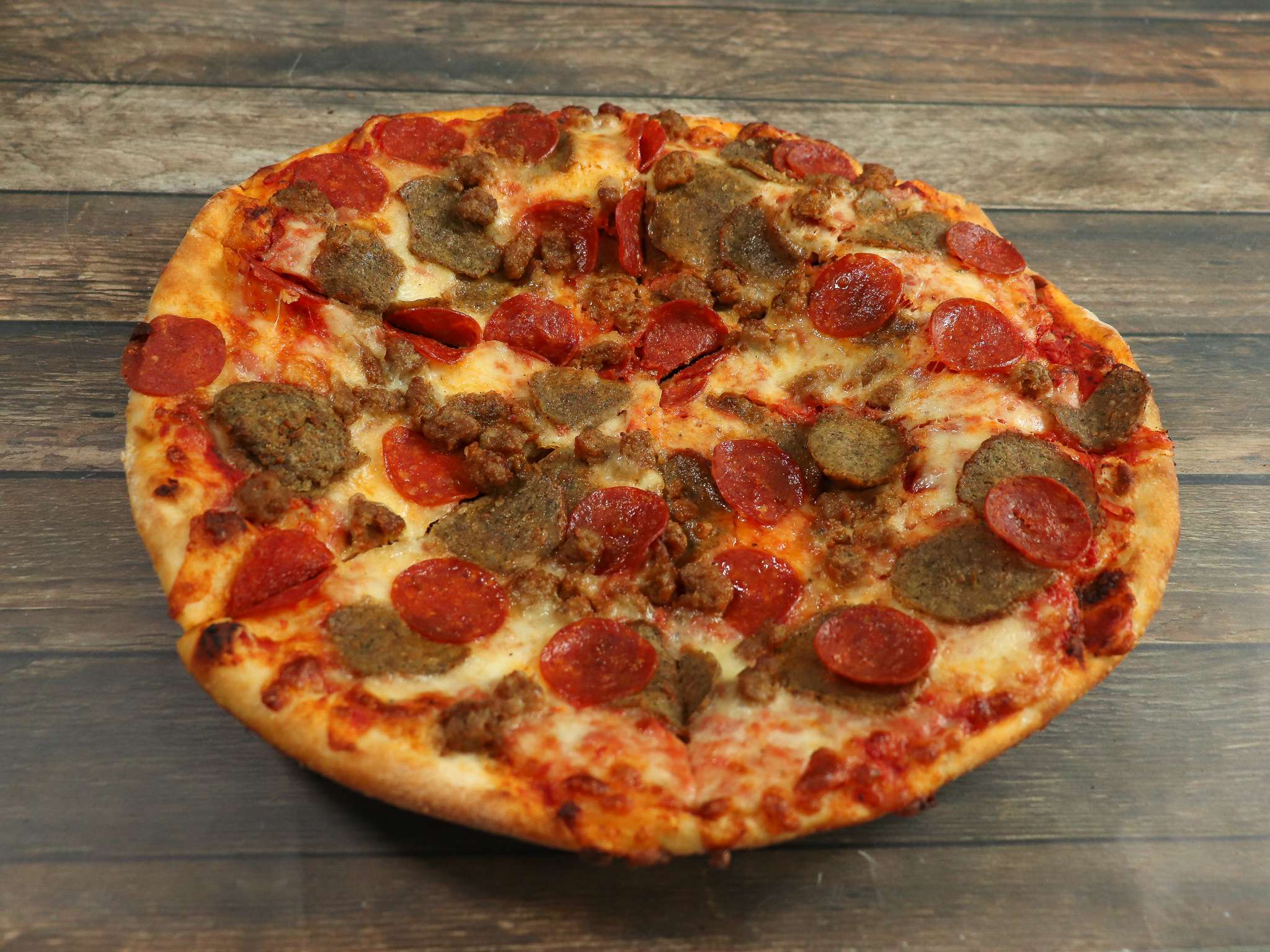 Order New York Pie food online from Guidos Pizza store, Eatontown on bringmethat.com