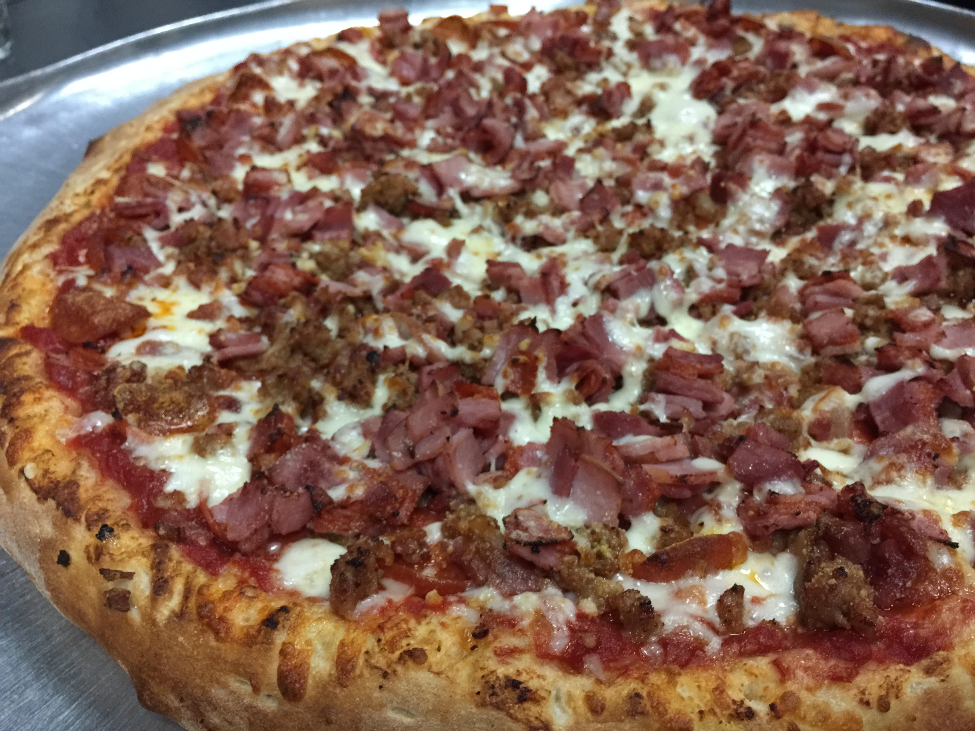 Order Meat Lovers Pizza food online from Pizza Parma store, Pittsburgh on bringmethat.com