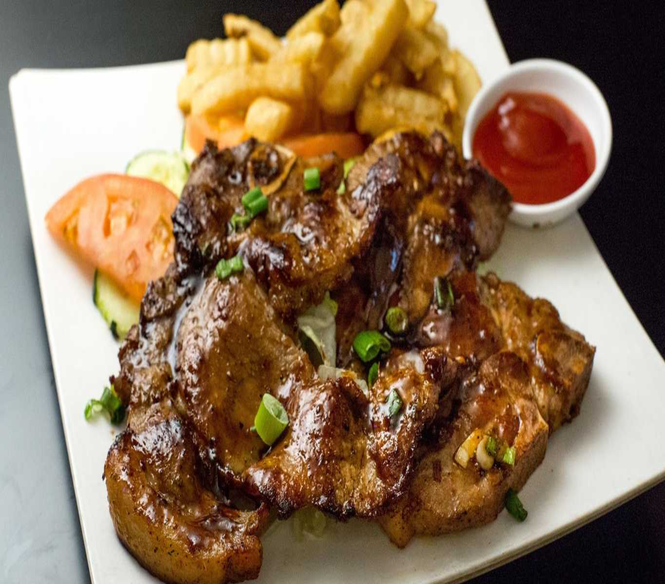 Order Pork Chop Steak with Black Pepper Sauce Lunch Special food online from At Nine Restaurant & Bar store, New York on bringmethat.com
