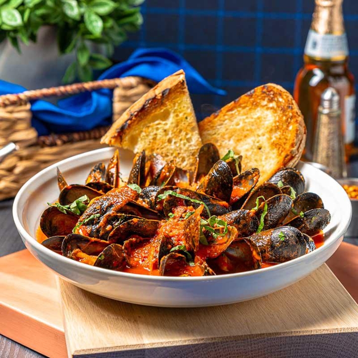 Order Steamed Mussels food online from Tavern On The Point store, Chicago on bringmethat.com