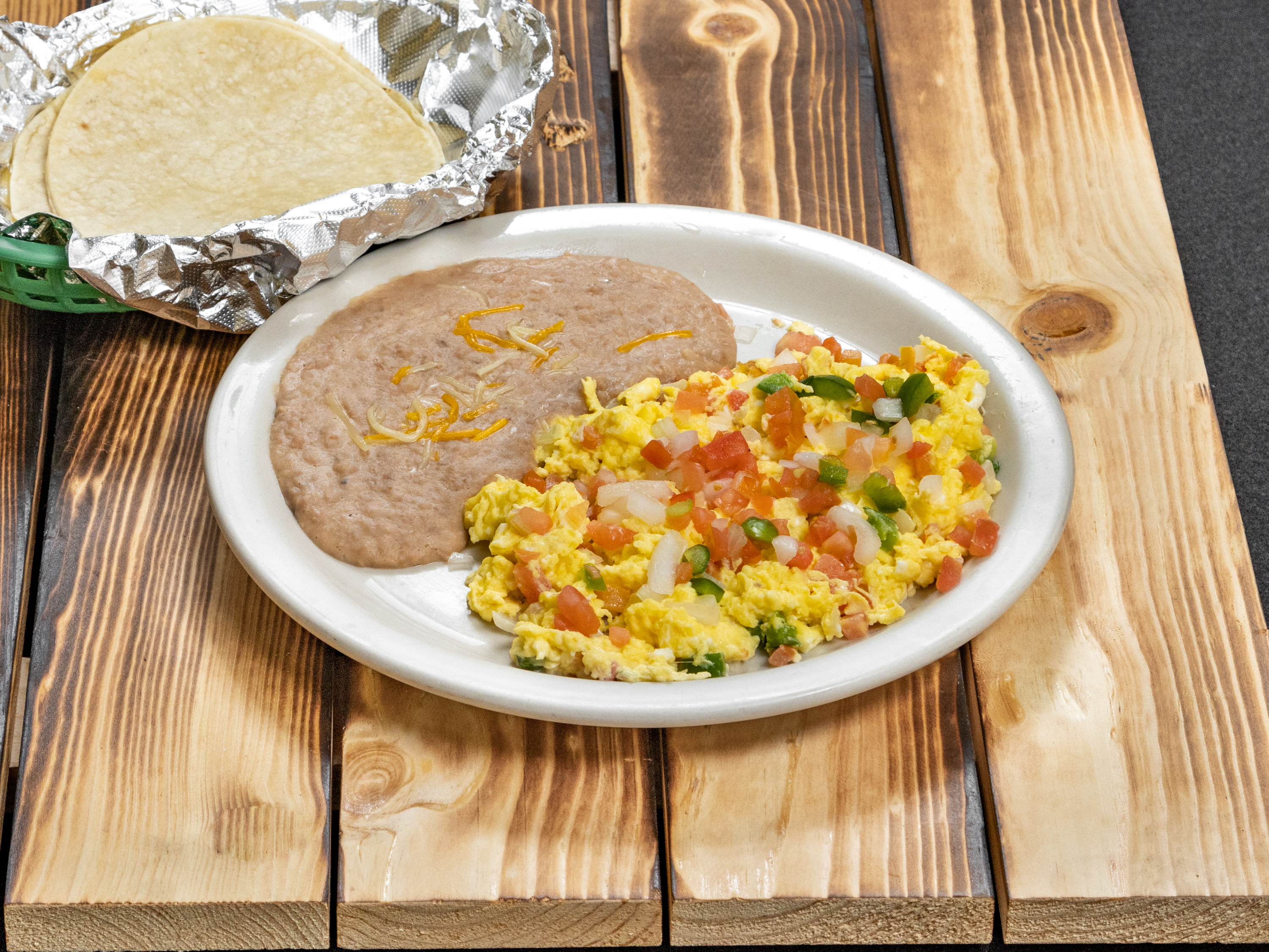 Order Huevos a la Mexlcana Breakfast food online from Restaurant Y Tacos El Chino store, Dallas on bringmethat.com