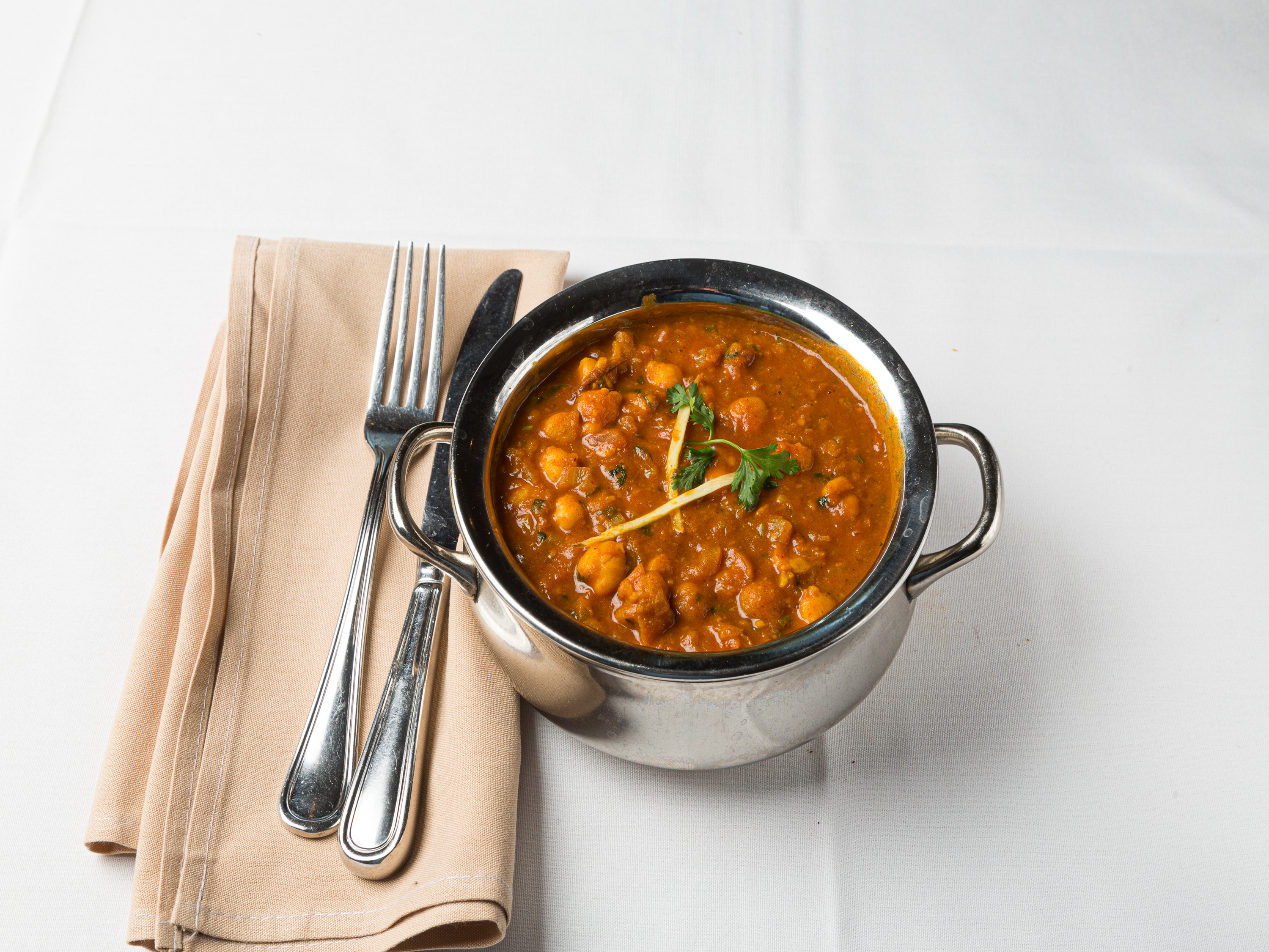 Order Chana Masala food online from Downtown Dhaba Inc store, Westwood on bringmethat.com
