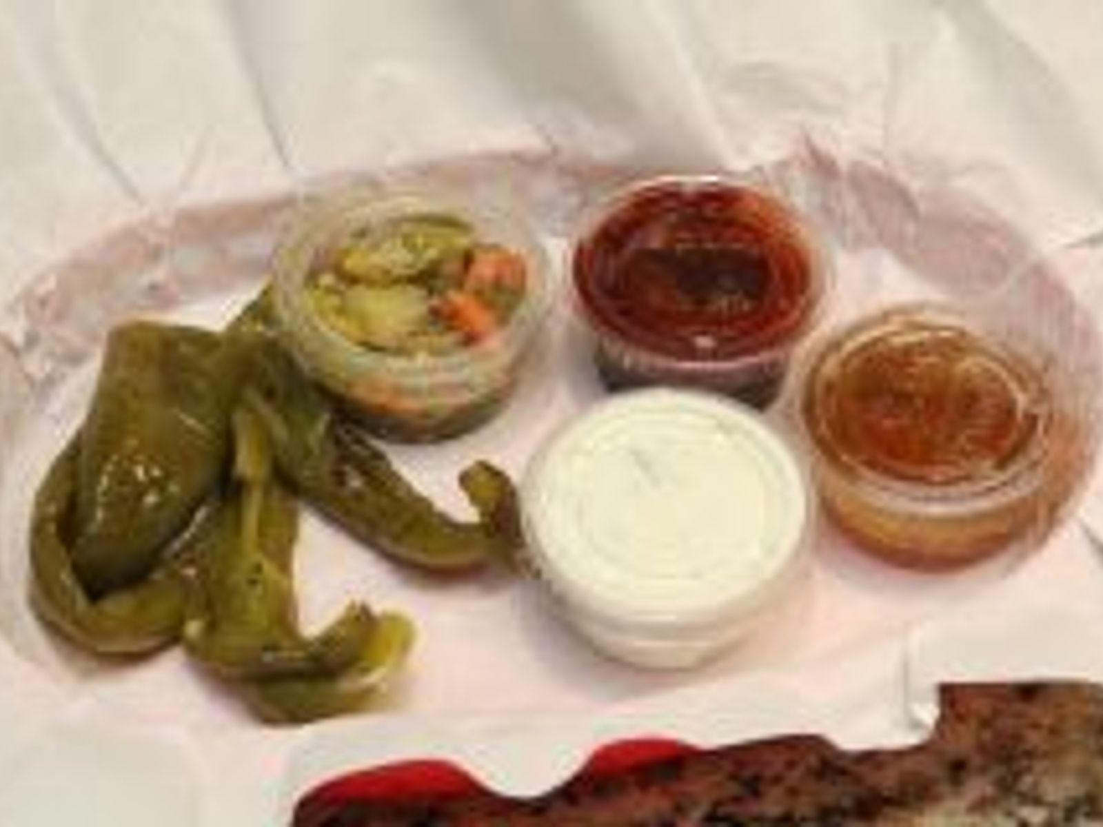Order Dressing, Sweet or Hot Peppers food online from Squabs Gyros store, Melrose Park on bringmethat.com