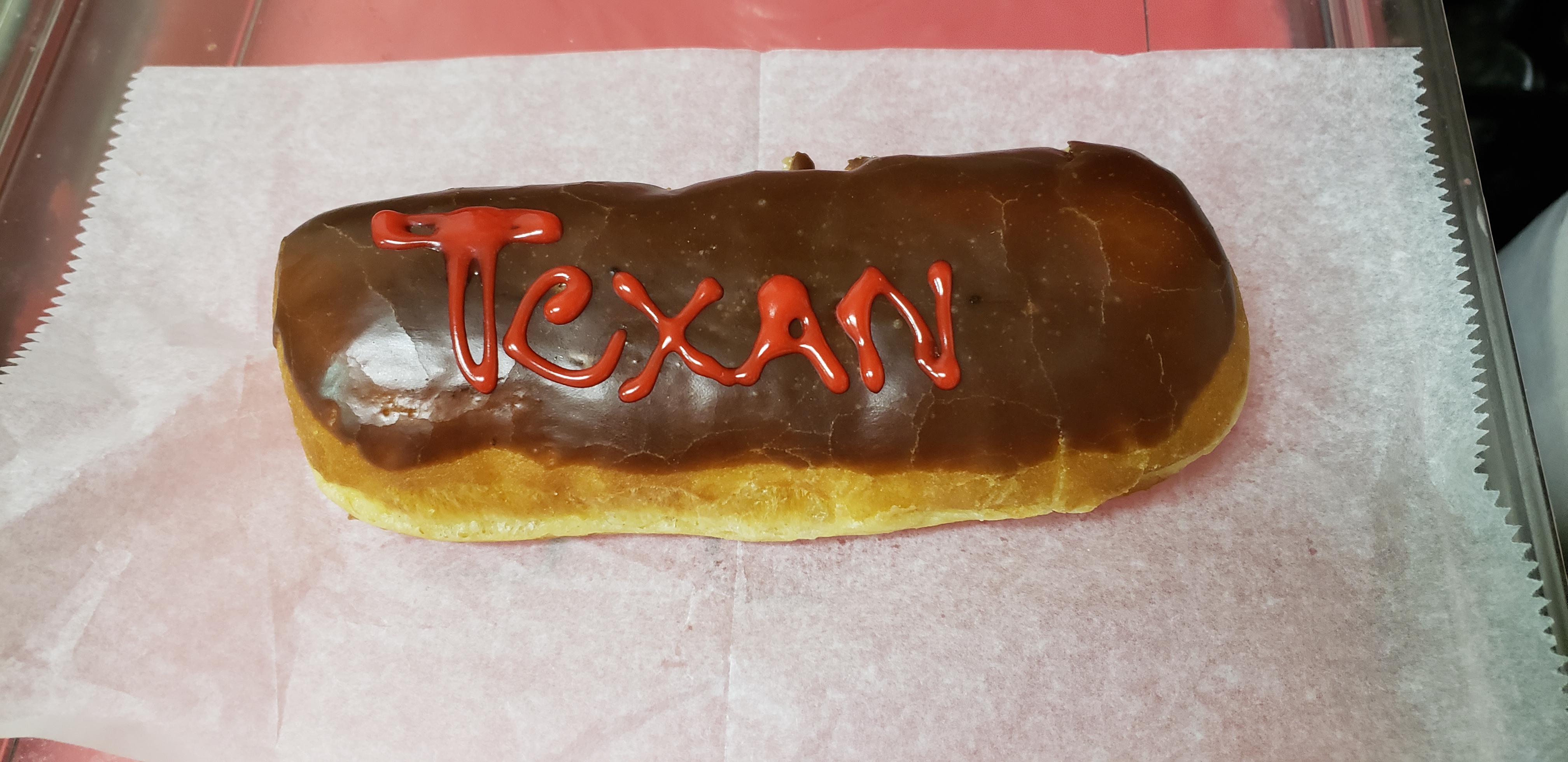 Order Eclairs food online from H-Town Donuts store, Houston on bringmethat.com