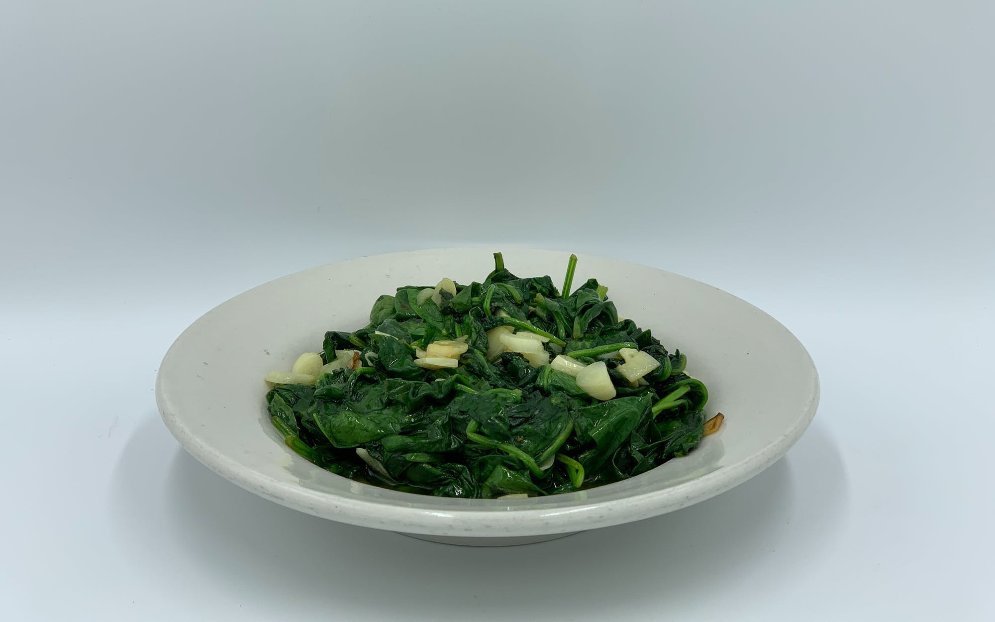 Order Sauteed Spinach - Side food online from Mario Pizza store, Westbury on bringmethat.com