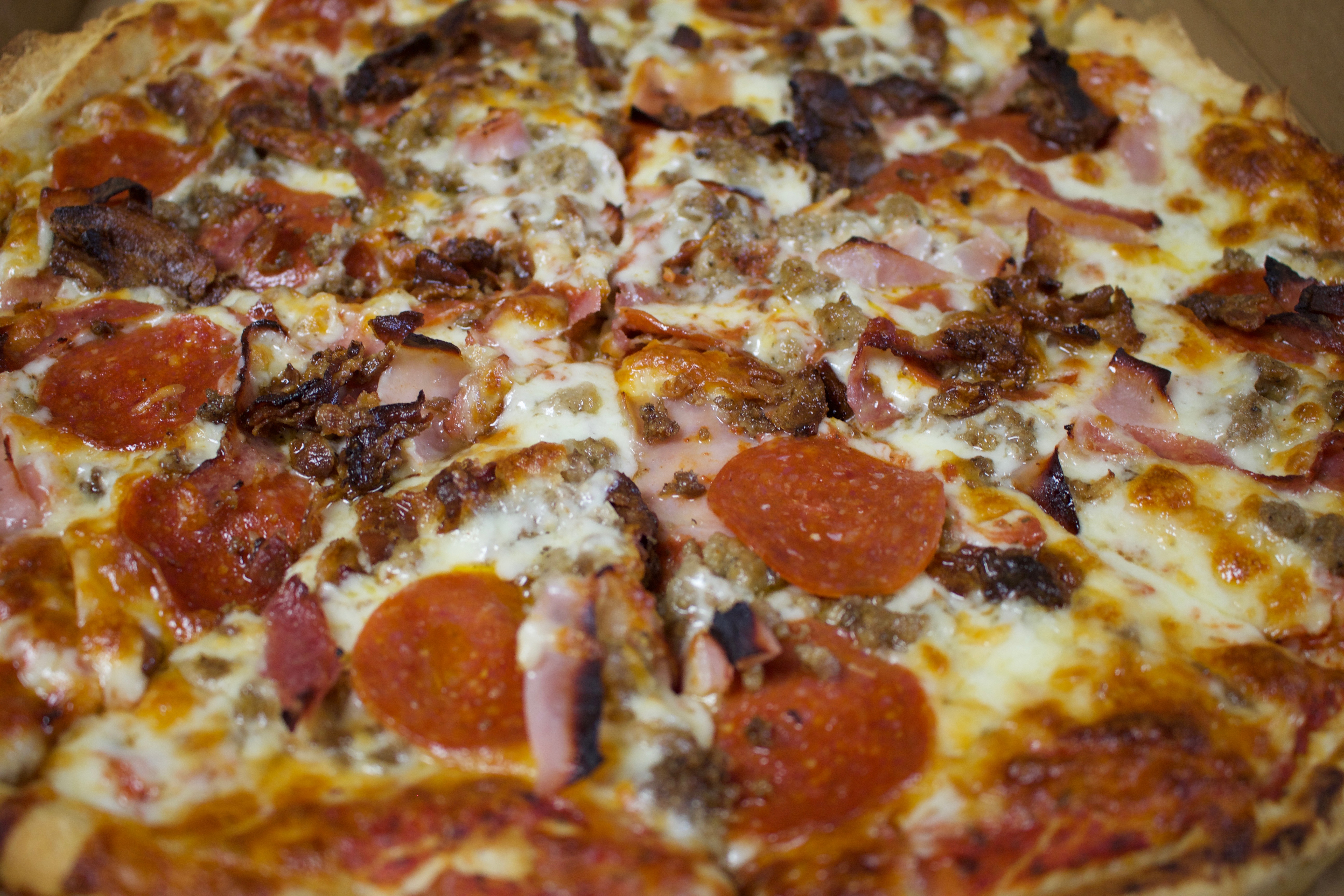 Order Meat Lovers Pizza food online from Pizza Palace store, Cockeysville on bringmethat.com