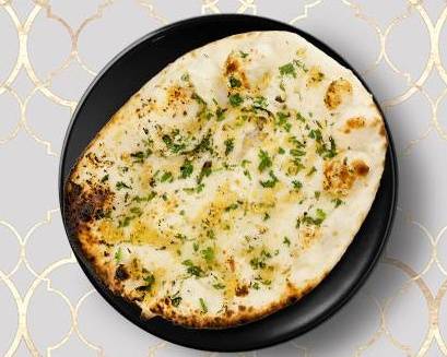 Order Galaxy Garlic Naan food online from Curry Villa store, Southern Pines on bringmethat.com