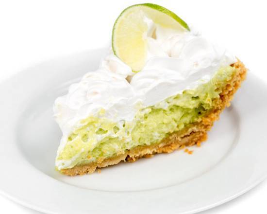 Order Key Lime Pie food online from Vegetarian Mexican Lounge store, Little Elm on bringmethat.com