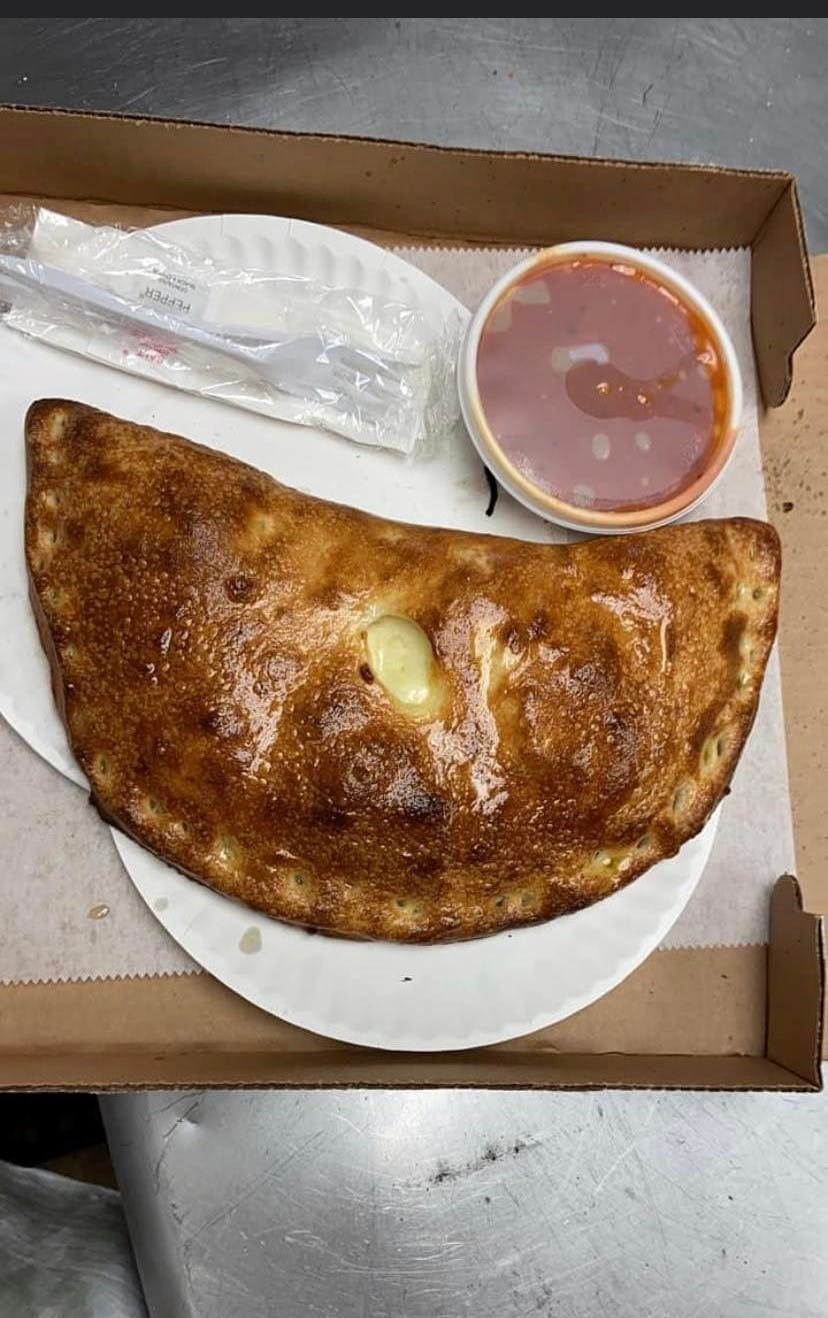Order Calzone - Small food online from Villa Pizzeria store, Exeter on bringmethat.com