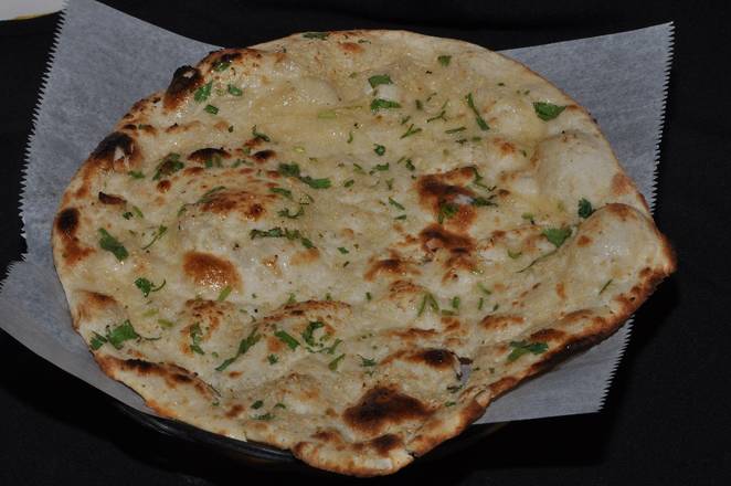 Order Chilli Garlic Naan food online from Deccan Spice store, Jersey City on bringmethat.com