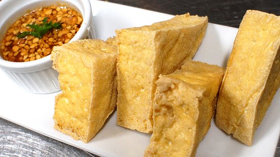Order Triangle Tofu food online from Siam Spice store, Sterling on bringmethat.com