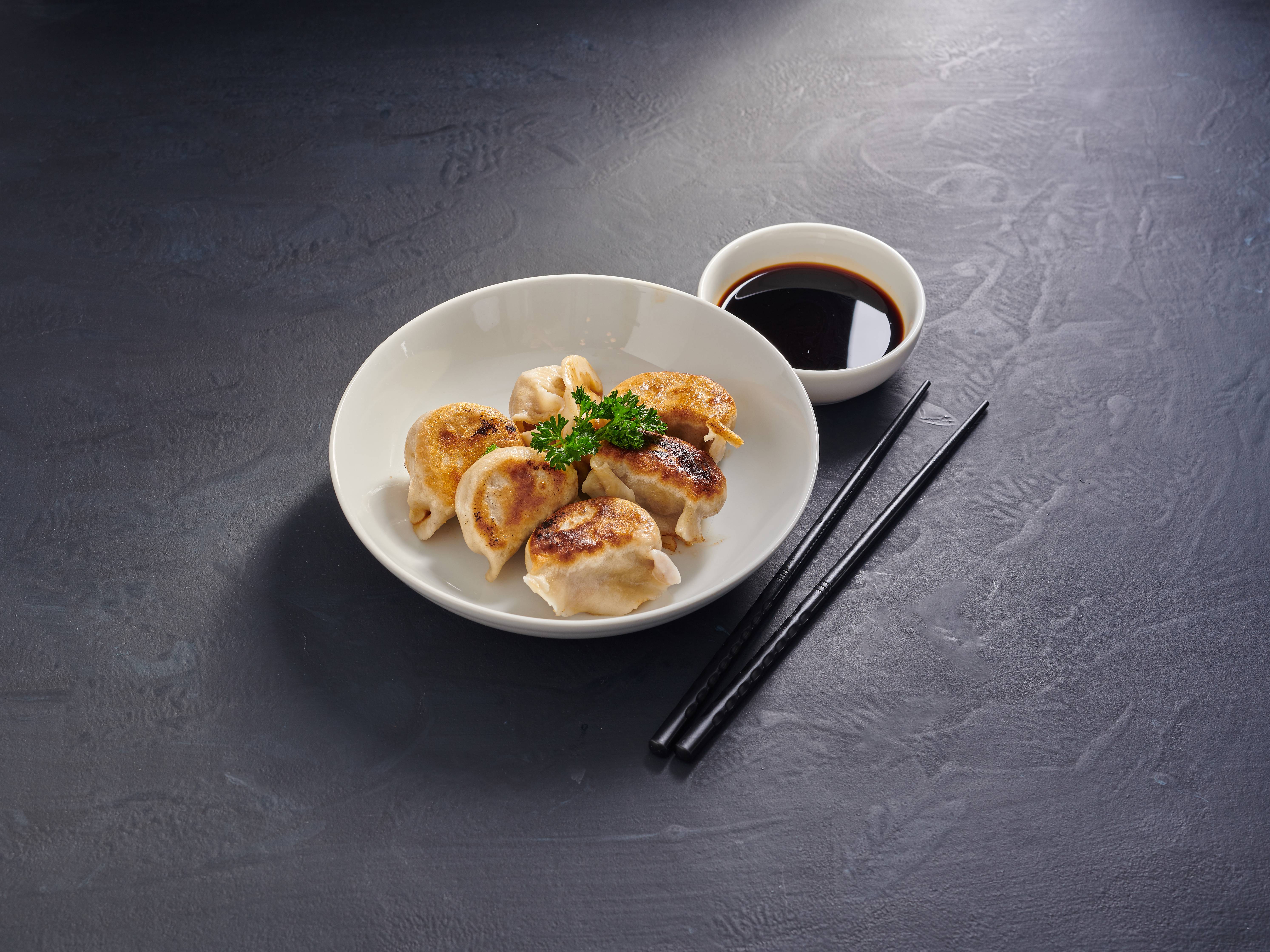 Order 6 Pieces Pot Stickers food online from Szechuan Kitchen store, Lake Oswego on bringmethat.com
