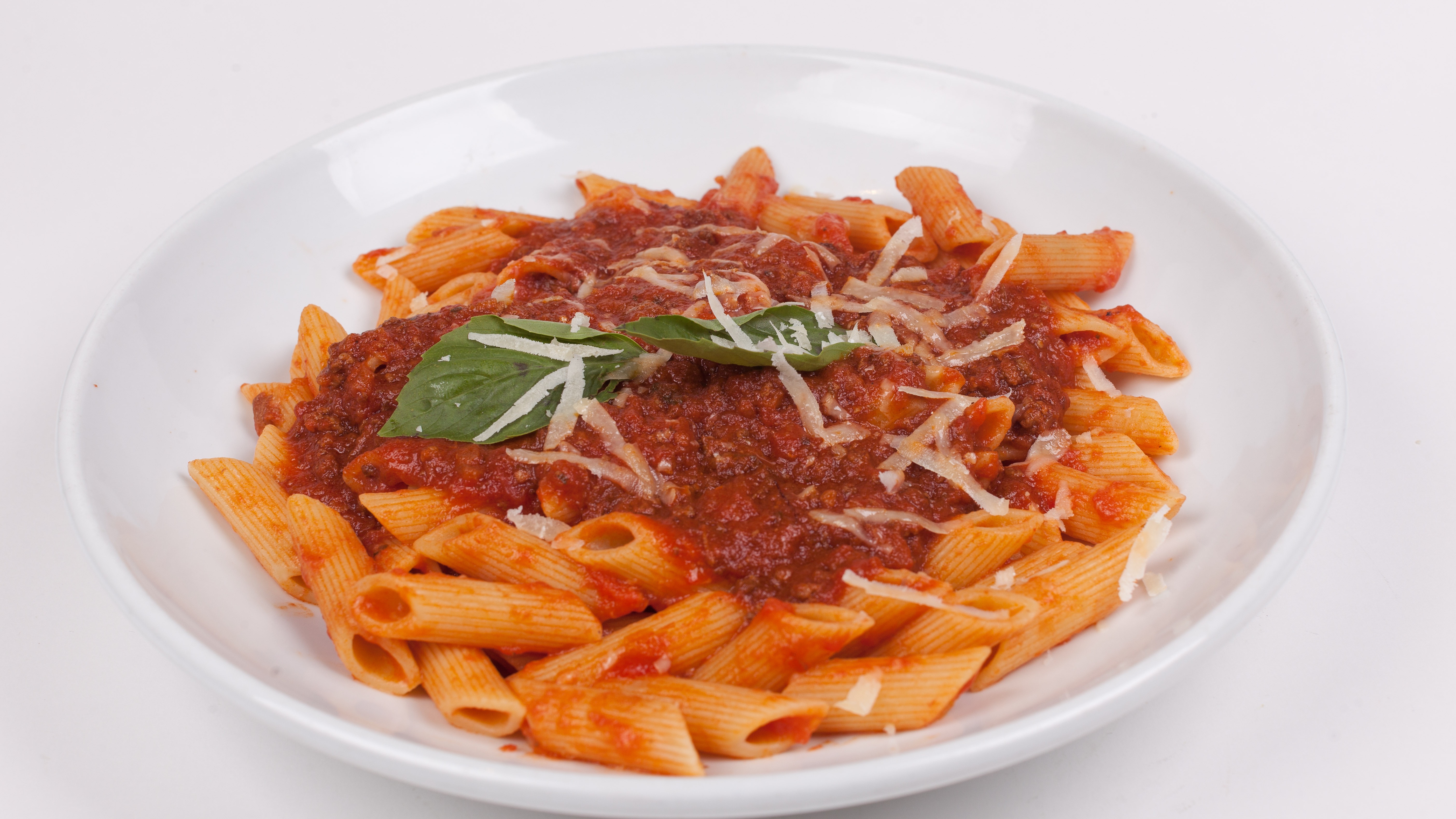 Order Penne Ragu food online from Umberto's Pizzeria store, New Hyde Park on bringmethat.com