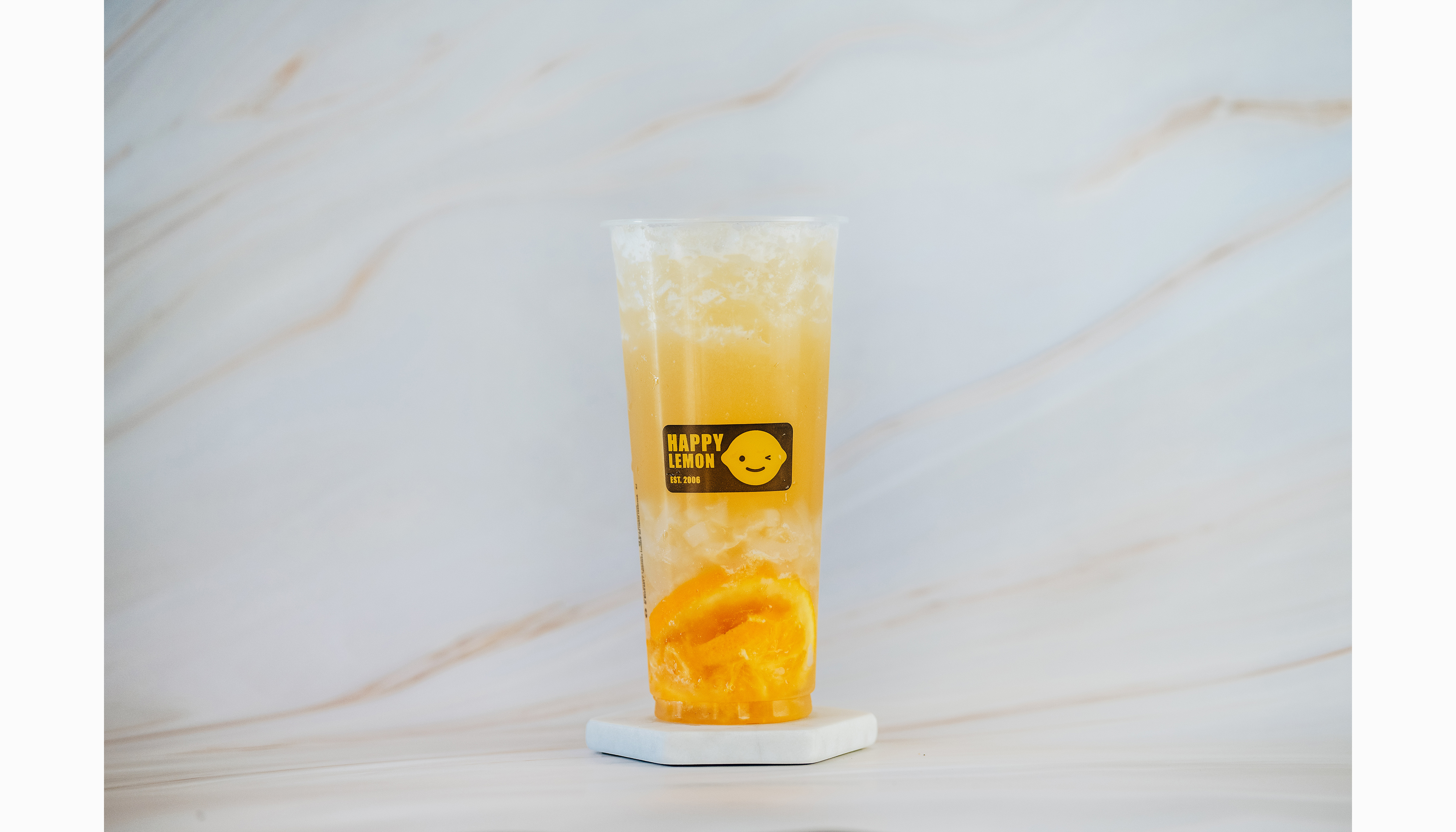 Order Honey Orange Green Tea with Lychee Jelly food online from Happy Lemon store, Portland on bringmethat.com