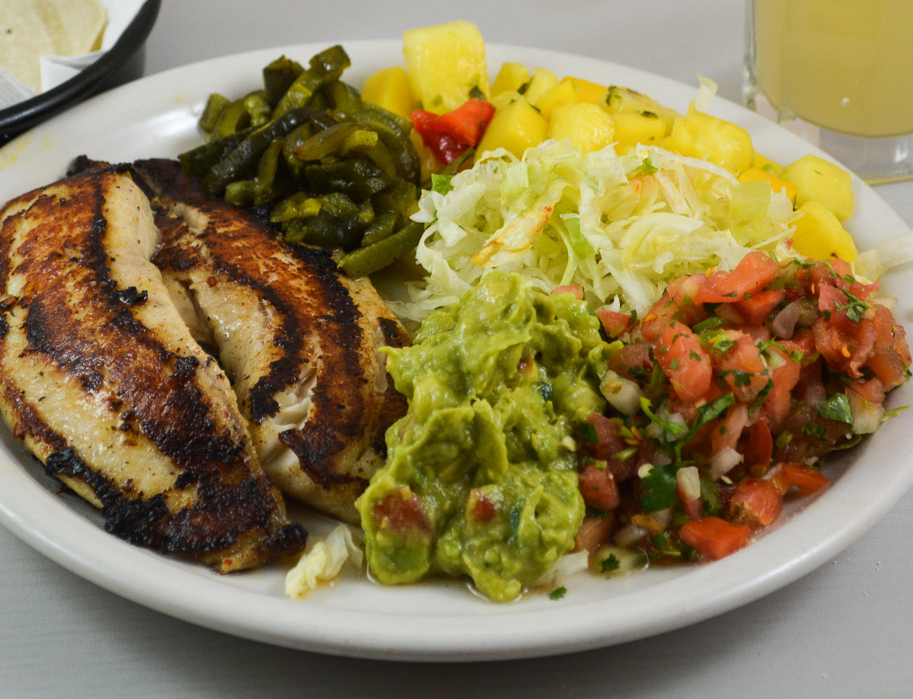 Order Grilled Fish Tacos food online from Tamales store, Highland Park on bringmethat.com