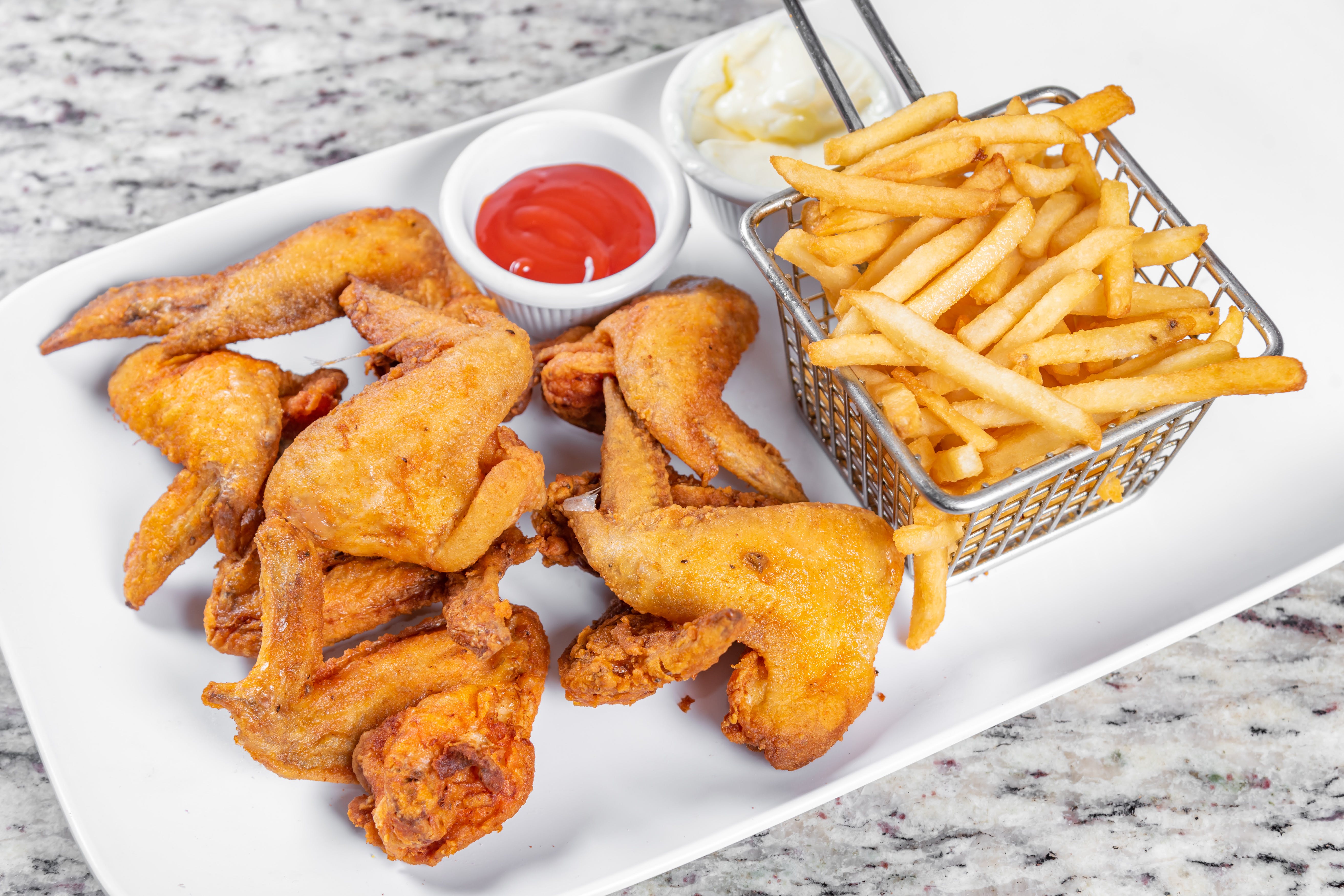Order Chicken Wings - 4 Pieces food online from Crown's Fried Chicken & Pizza store, East Orange on bringmethat.com