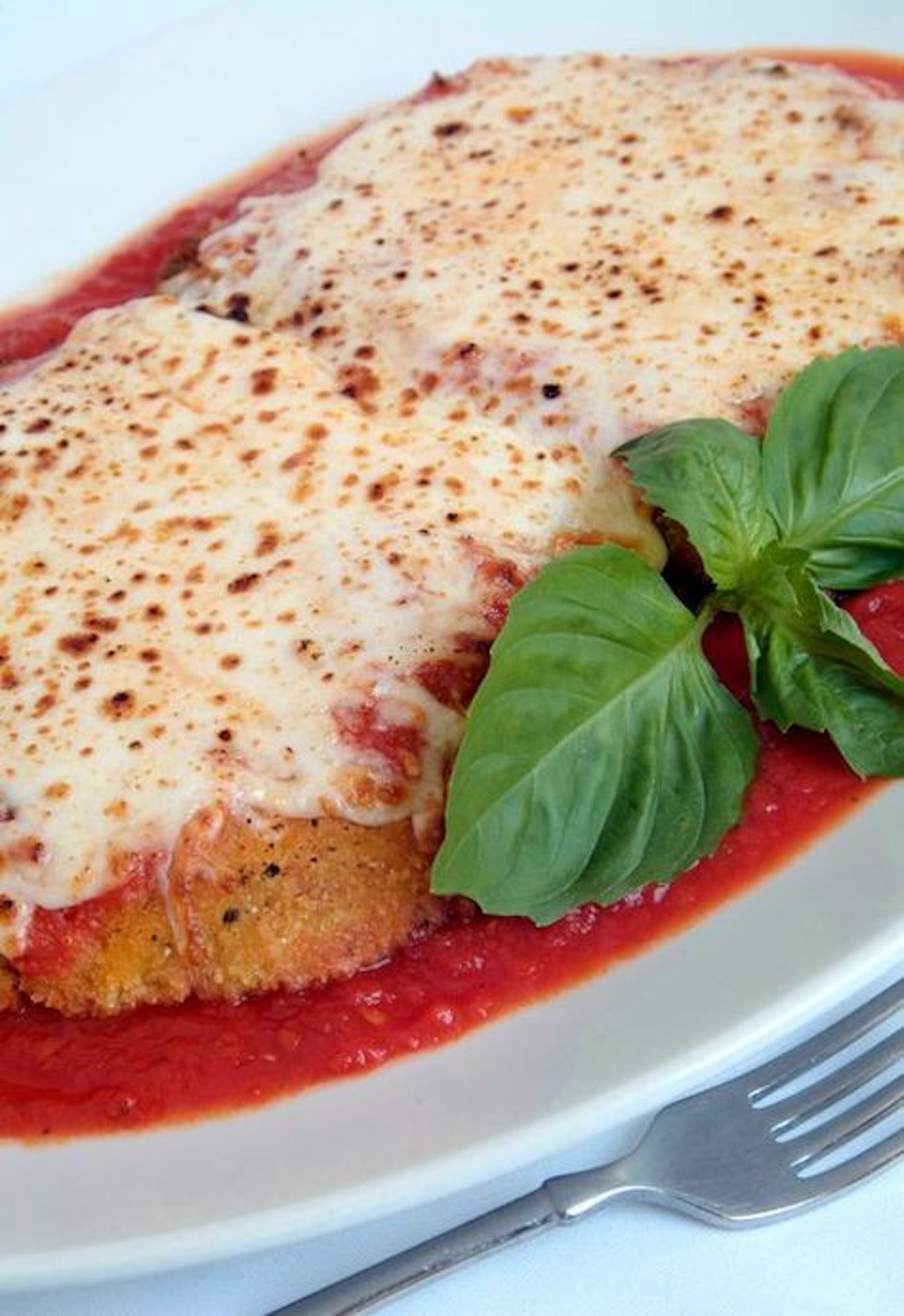 Order 61. Veal Parmigiana food online from Fellini Cafe Of Media store, Media on bringmethat.com