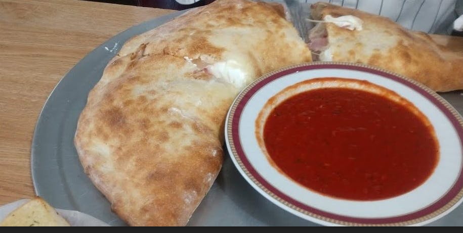 Order Calzone - Small food online from 4 Brothers Pizzeria & Restaurant store, Greenwood Lake on bringmethat.com