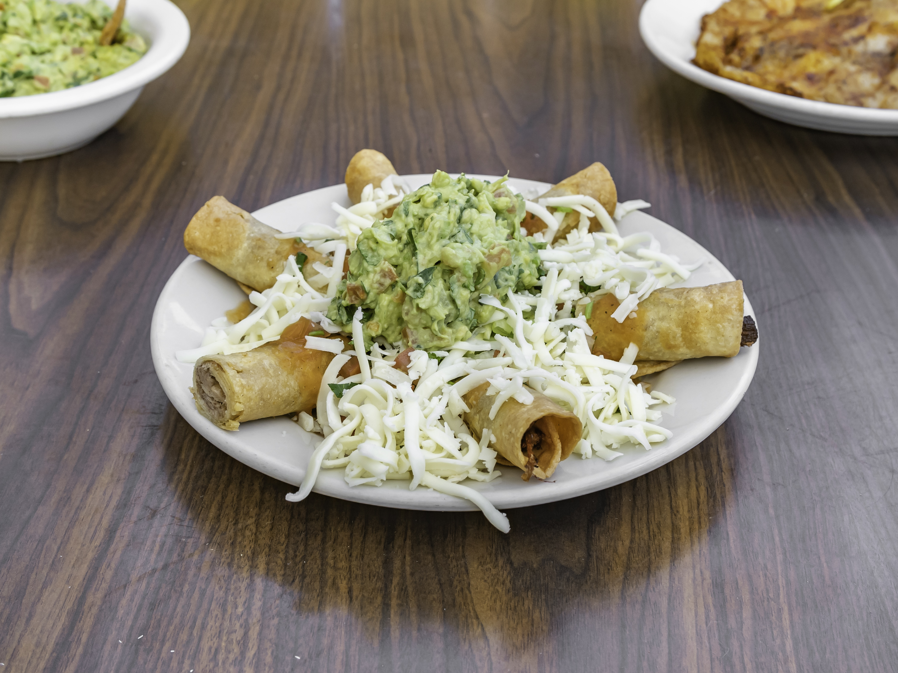Order 4. Taquitos food online from Poco Mexican Restaurant store, Los Angeles on bringmethat.com