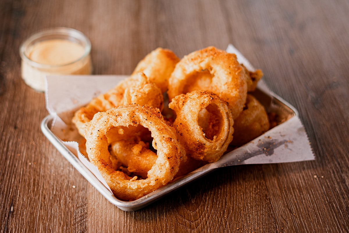 Order Beer-Battered Onion Rings food online from Logan's Roadhouse store, Lexington on bringmethat.com