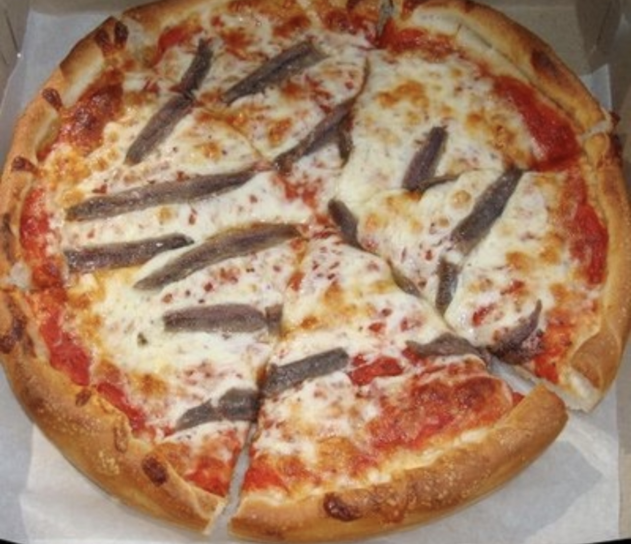 Order Anchovies Pizza food online from Rocco's Pizzeria store, Bronx on bringmethat.com