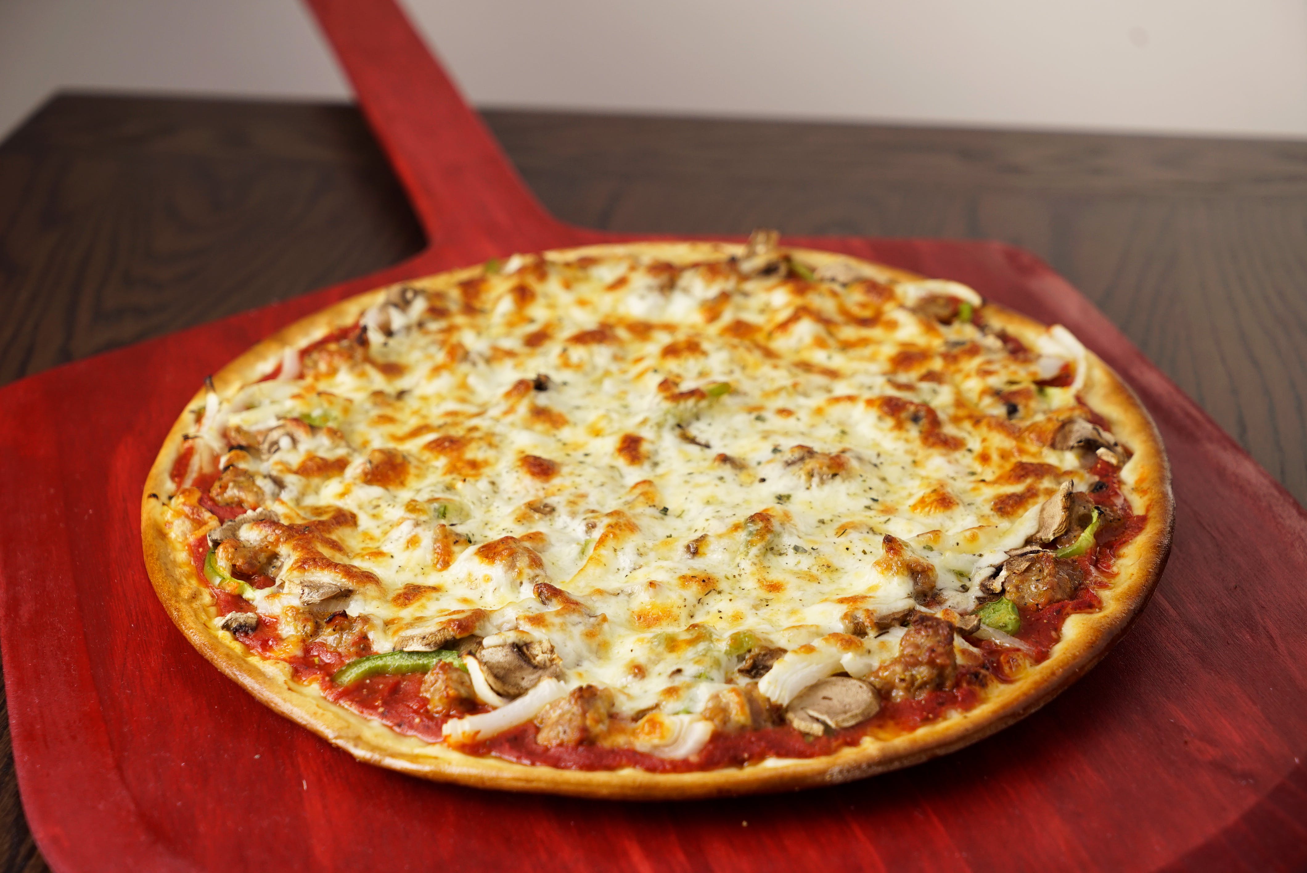 Order Buy Any 18" Pizza, get a FREE 12" Thin Crust Pizza Free - Special food online from Rosati Pizza store, Maricopa on bringmethat.com