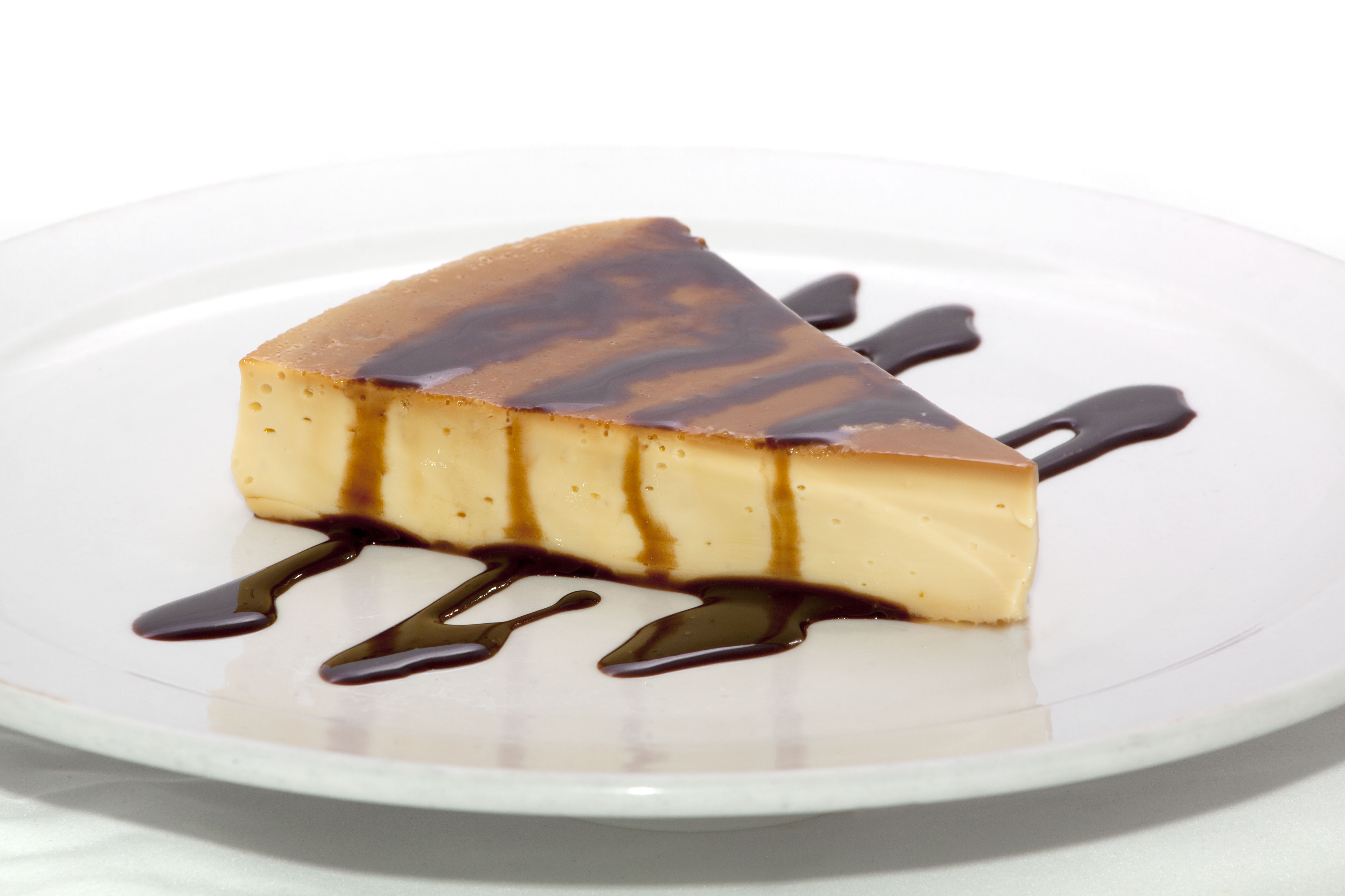Order Flan food online from North of The Border Mexican Restaurant store, Bartlett on bringmethat.com