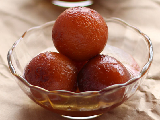 Order 2 Pieces Gulab Jamun food online from Dosa Place store, Fremont on bringmethat.com