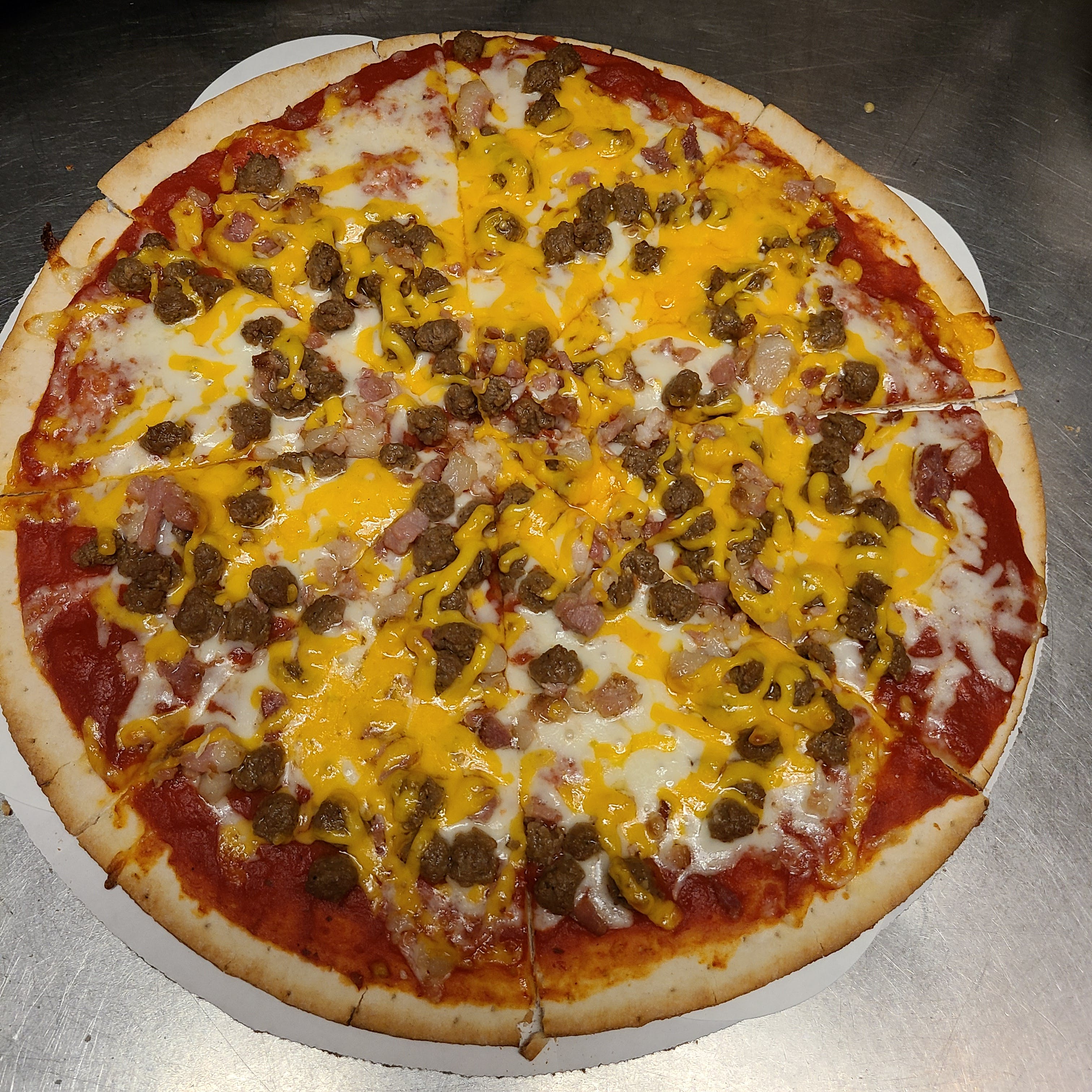 Order Bacon Cheeseburger Pizza - 10'' (Serves 1-2) food online from Timber Creek Pizza Co store, Lake Mills on bringmethat.com
