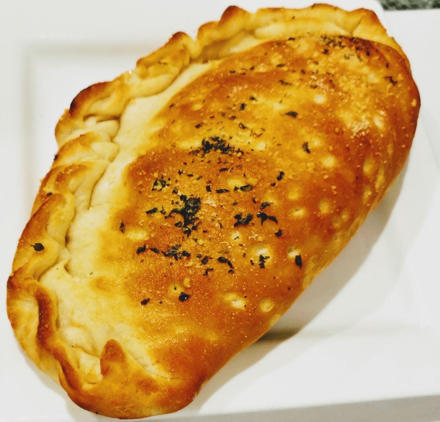 Order House Specialty Calzone - Calzone food online from Angelos Restaurant & Pizza store, Spring Valley on bringmethat.com