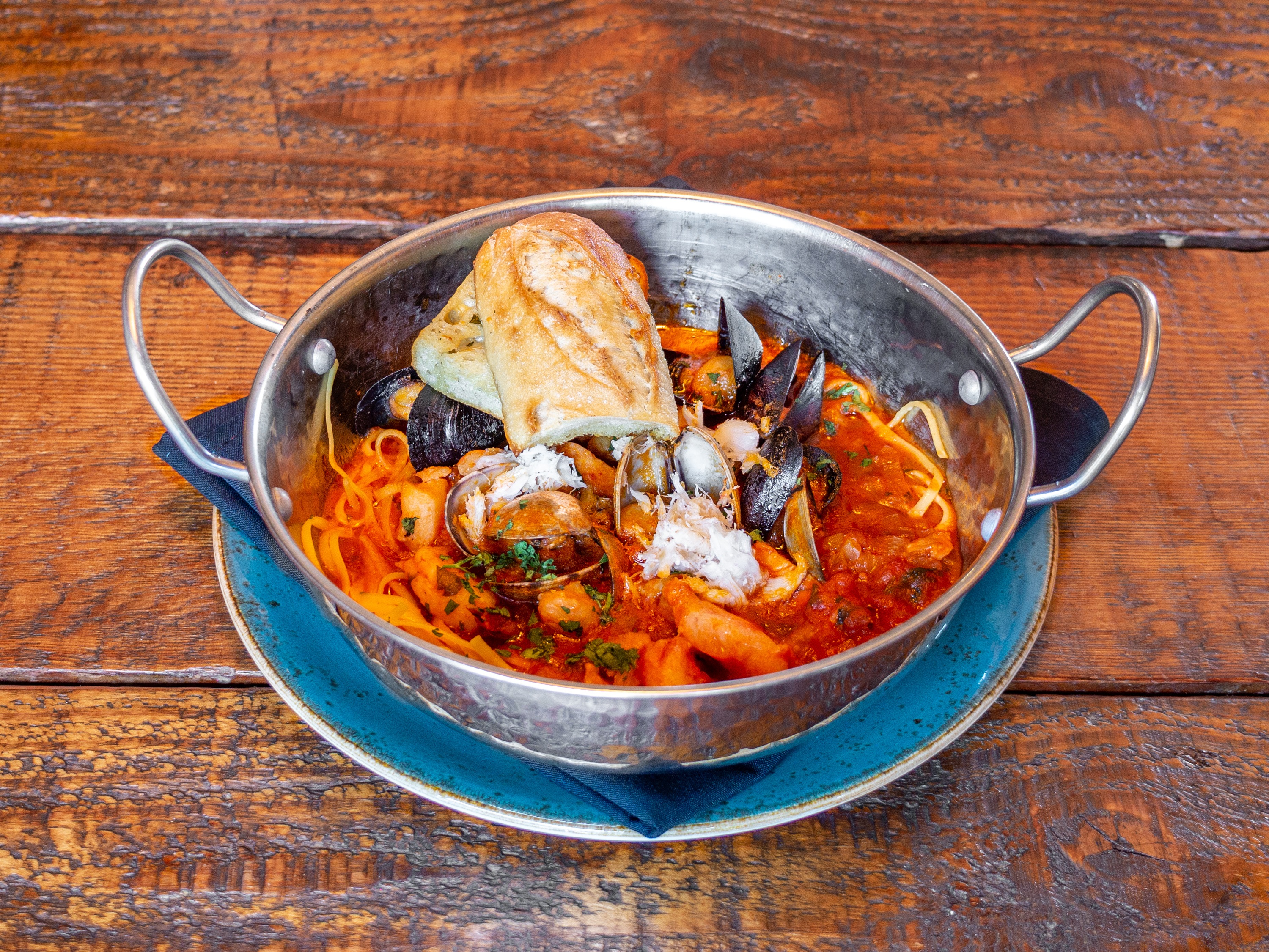 Order Cioppino food online from Rustic House Oyster Bar and Grill store, San Carlos on bringmethat.com