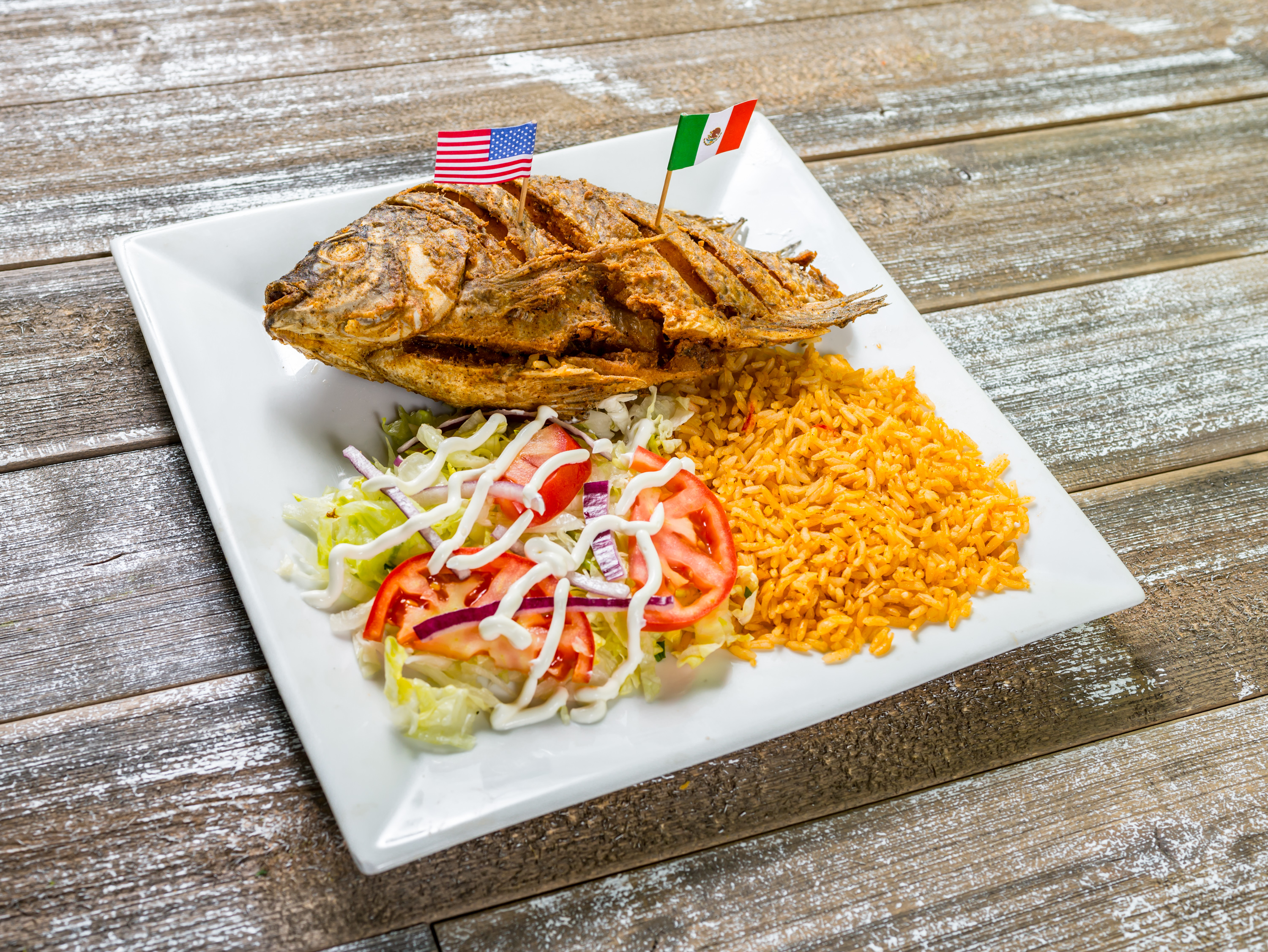 Order Mojarra Frita  food online from Tequila Mexican Grill Bakery & Store store, Lancaster on bringmethat.com
