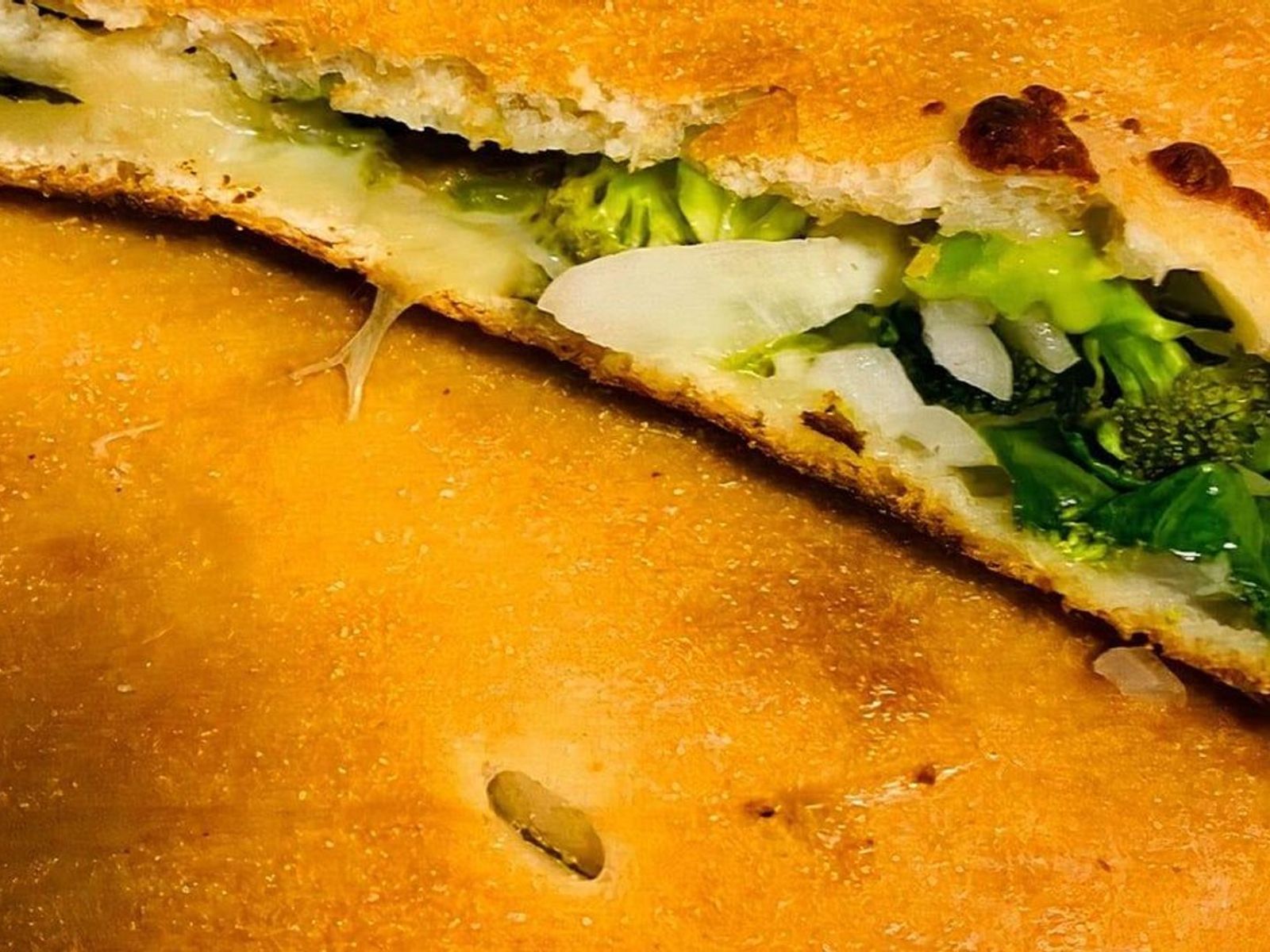 Order SPINACH FETA CALZONE food online from Lisa's Family Pizzeria - Wakefield store, Melrose on bringmethat.com